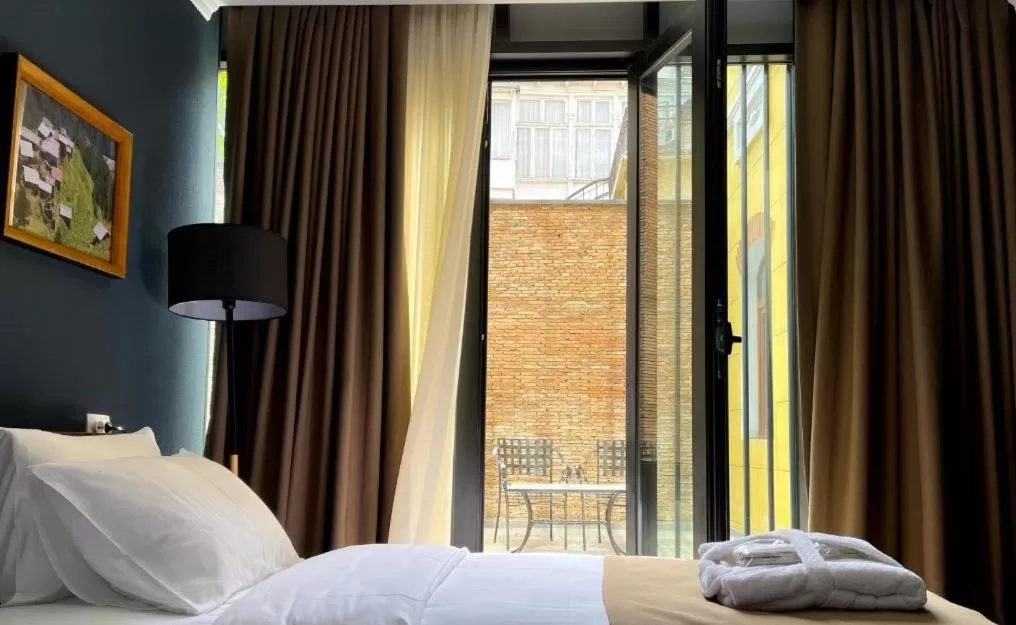 Patio, Bed in Bricks Hotel