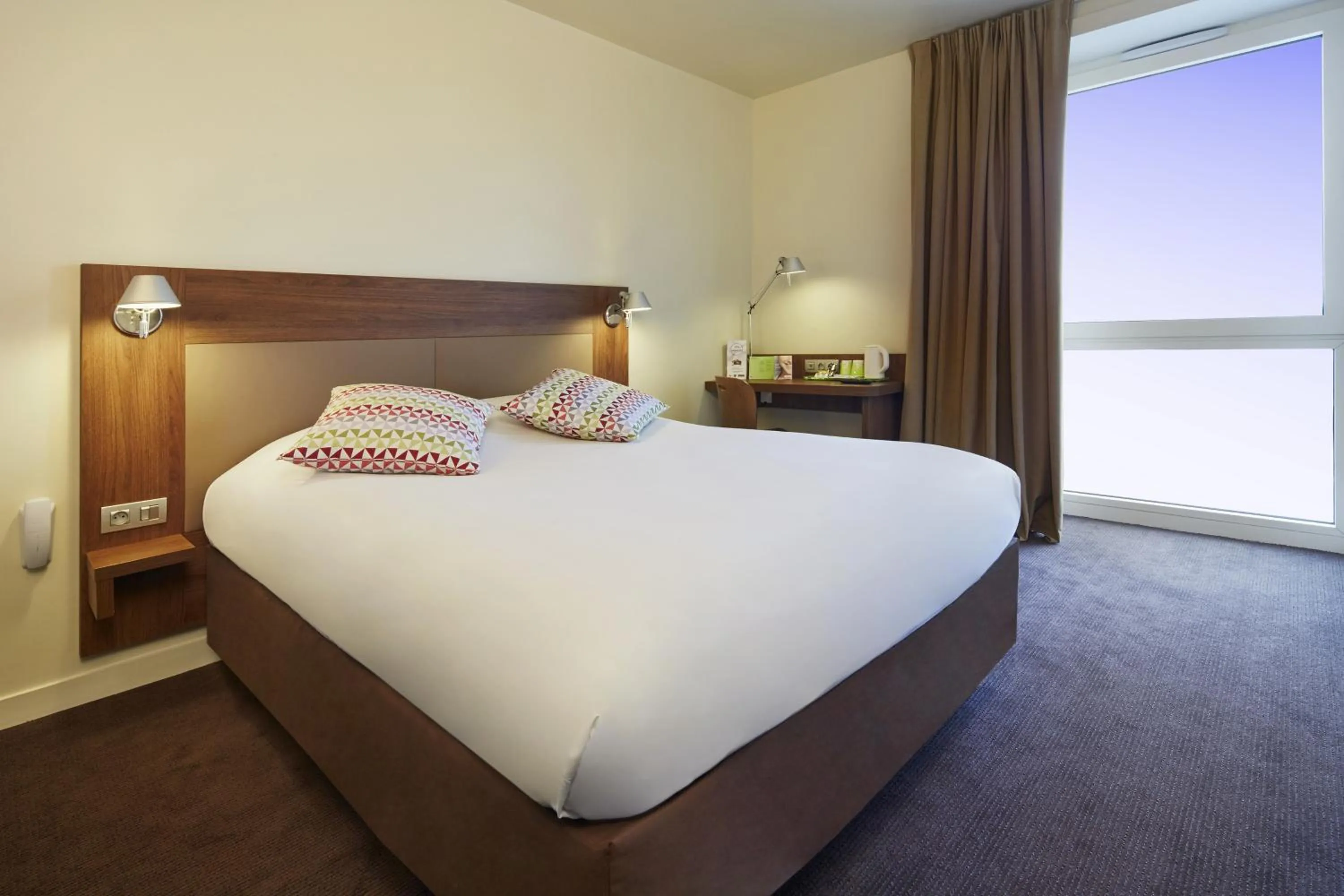 Photo of the whole room, Bed in Campanile PRIME - Paris Saclay