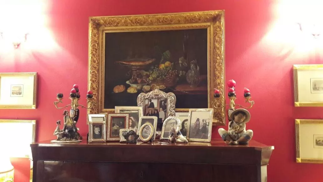 Communal lounge/ TV room in B&b Silvana