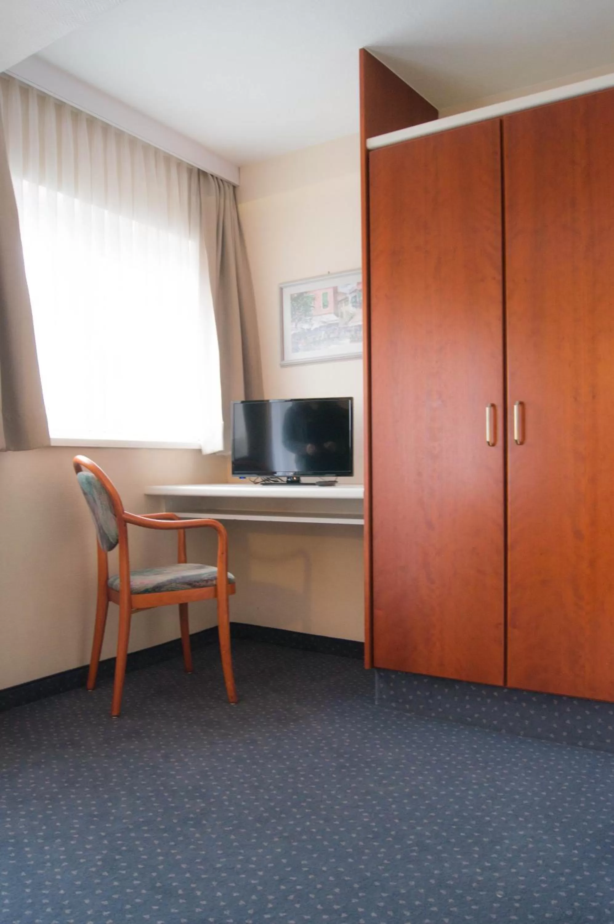 Photo of the whole room, TV/Entertainment Center in Haus Marquet