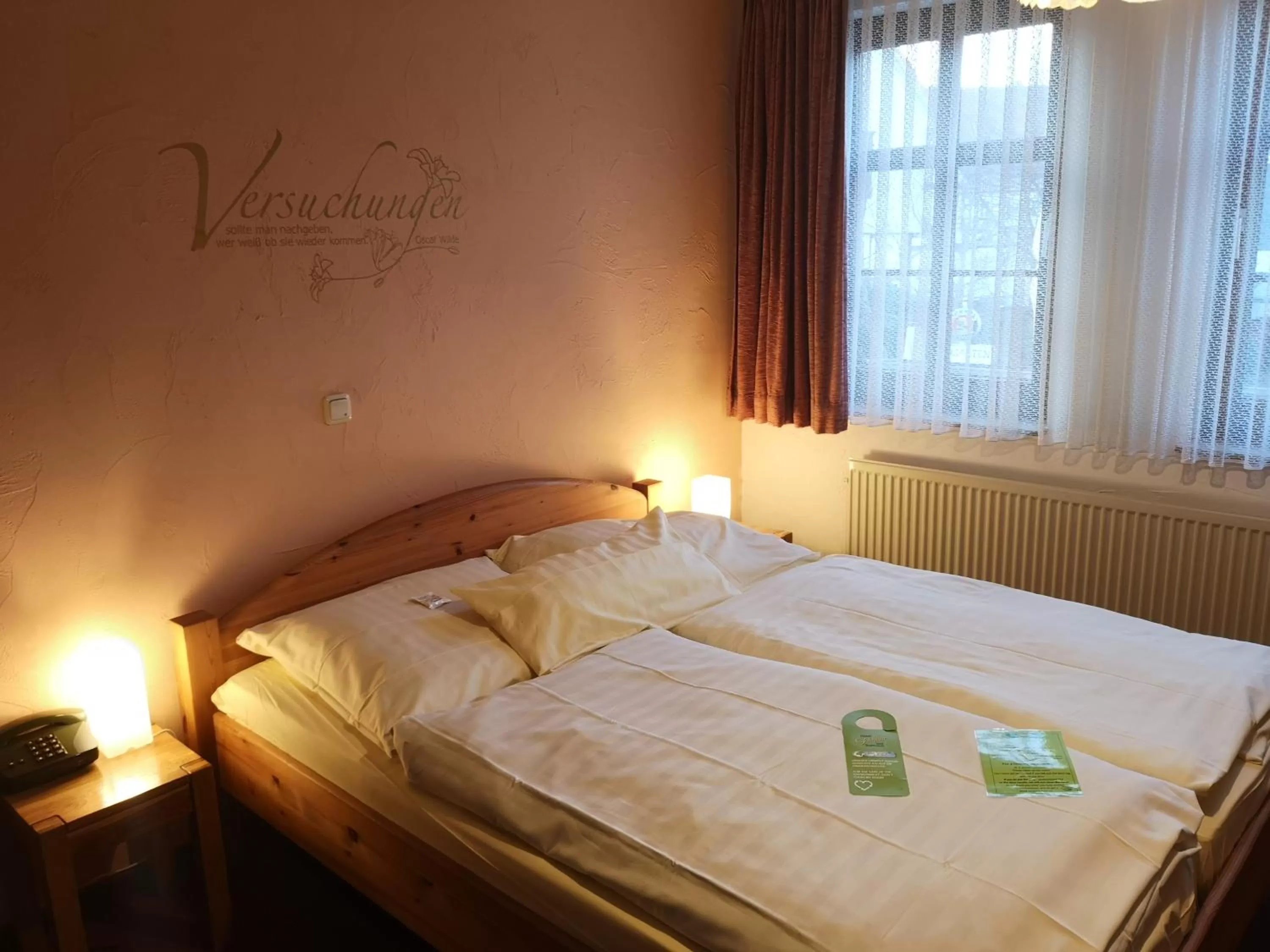 Bed in Hotel Goldflair am Rathaus