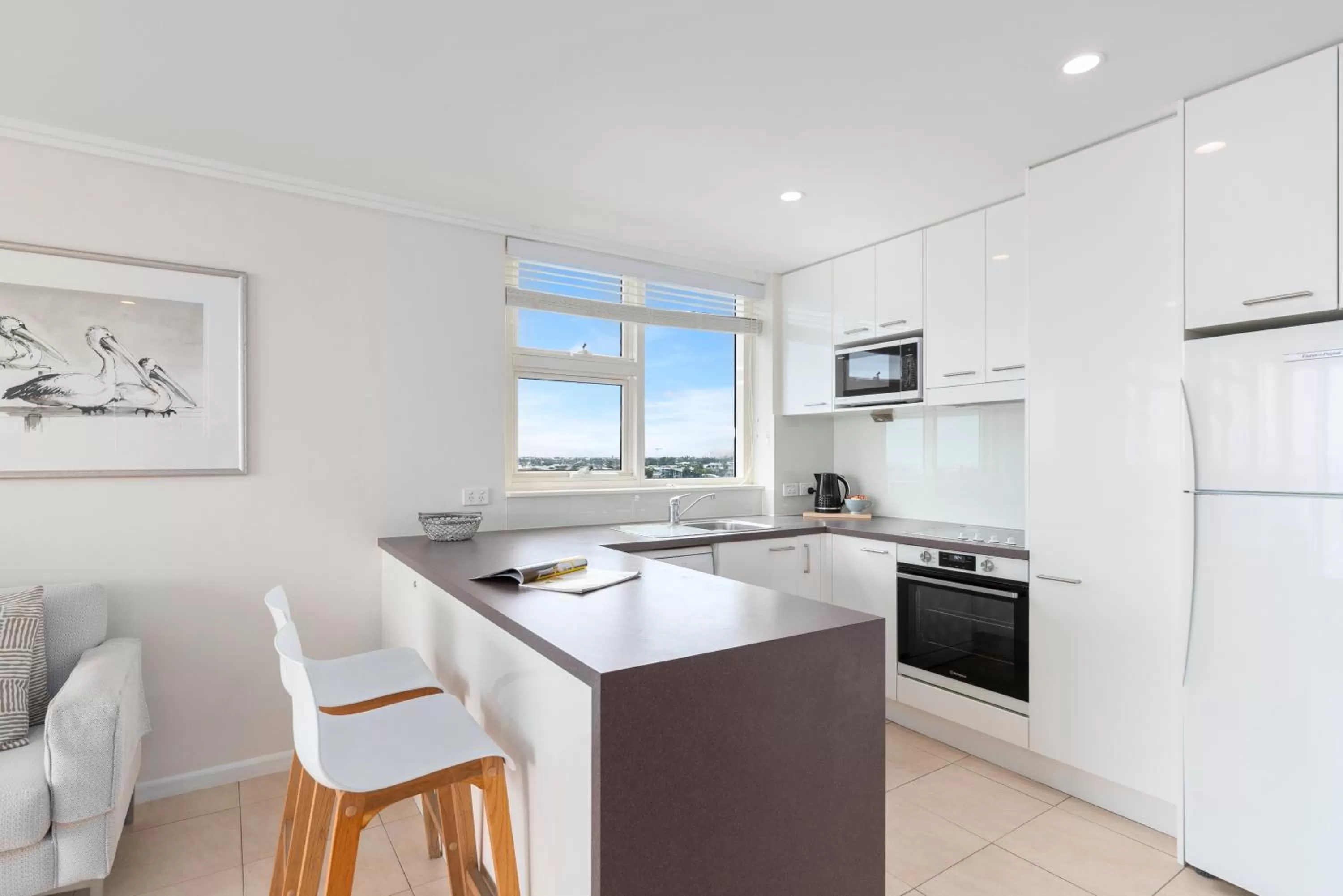 Kitchen or kitchenette in 84 The Spit Holiday Apartments