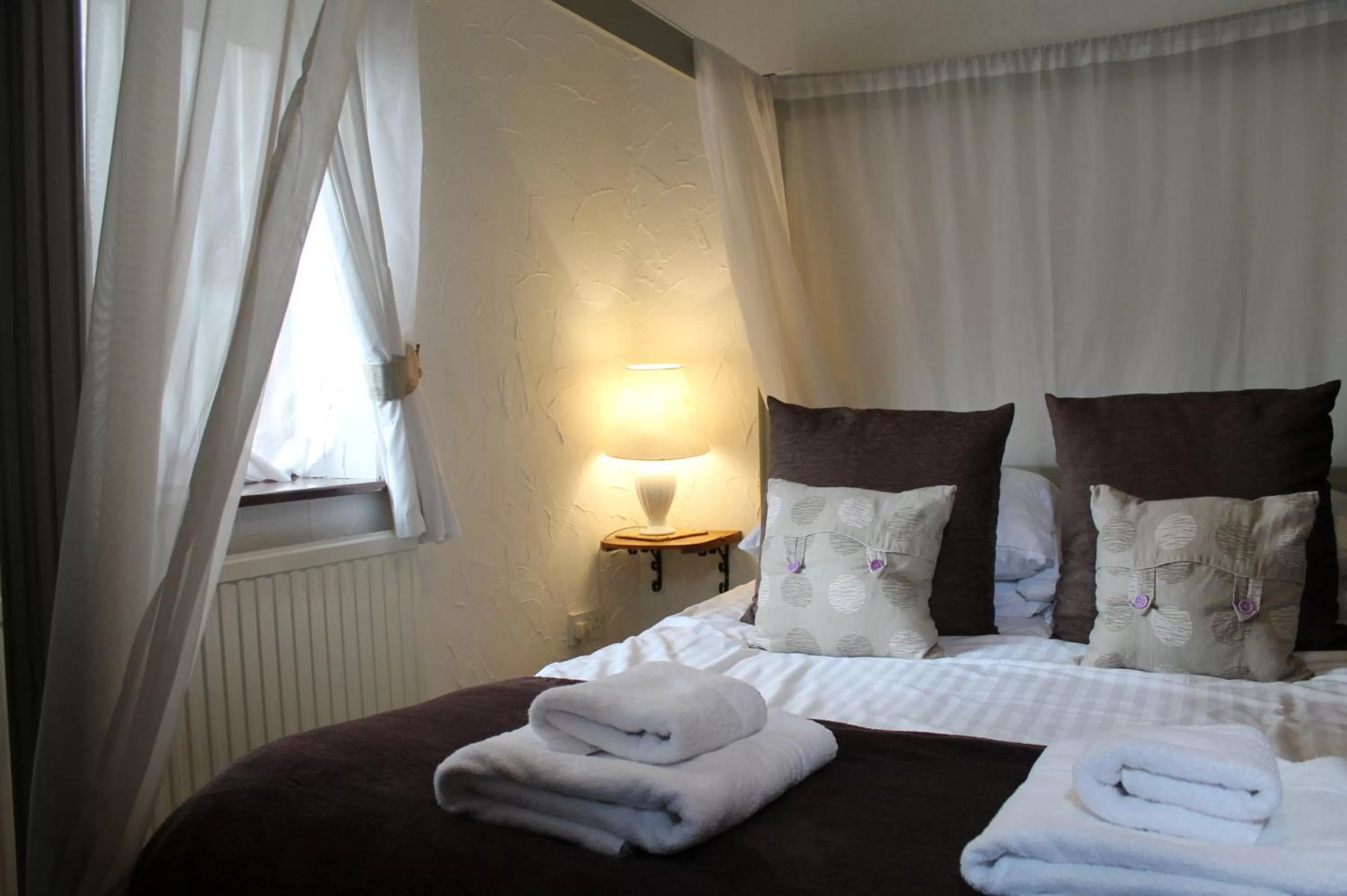 Bed in Old Court Hotel & Apartments