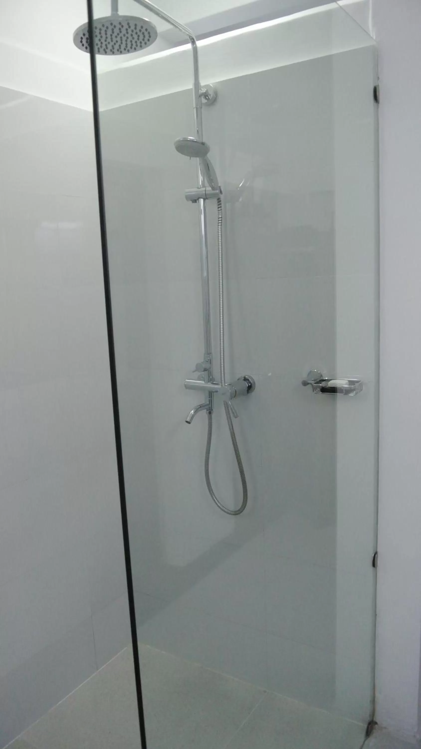 Bathroom in "27" Spathodea- Oasis in the City