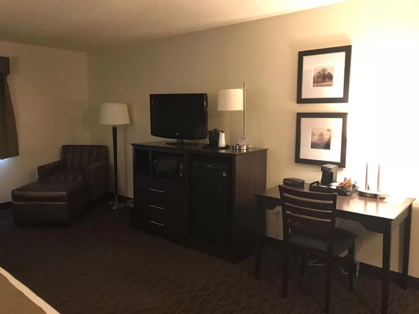 TV and multimedia in AmericInn by Wyndham Hotel and Suites Long Lake