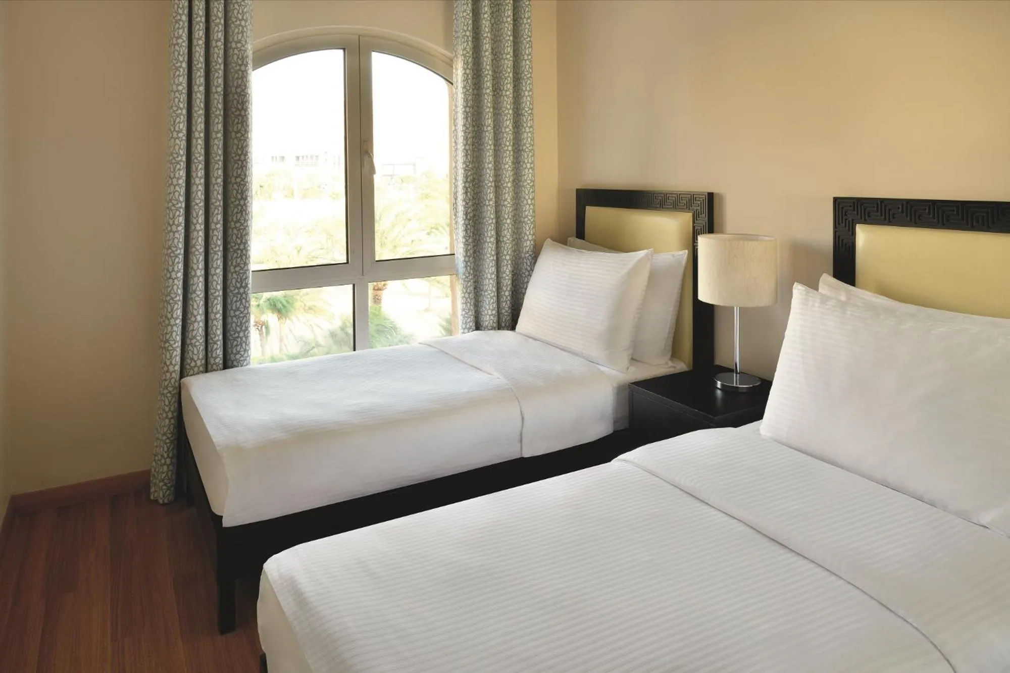 Property building, Bed in Mövenpick Resort & Residences Aqaba