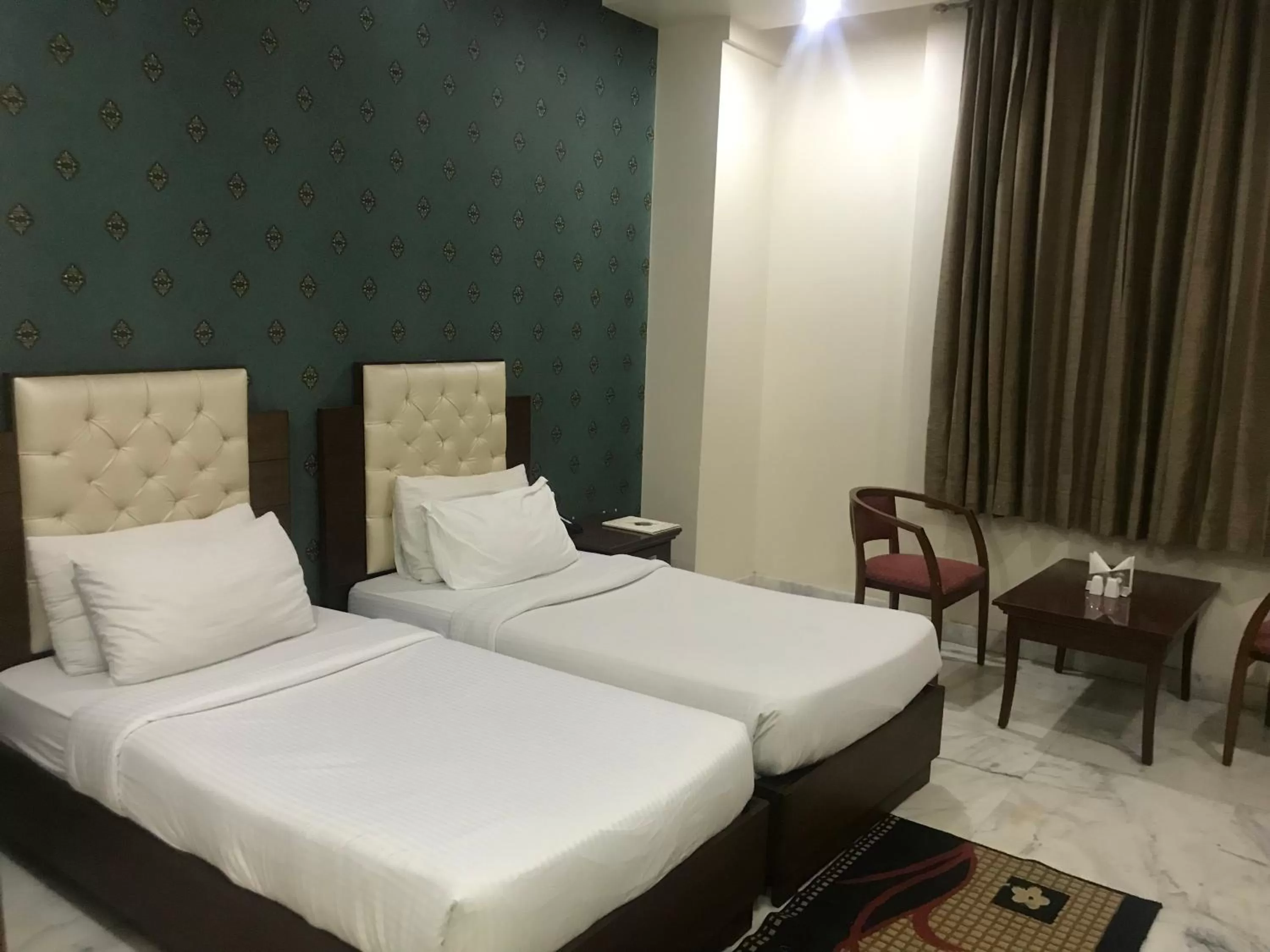 Bed in Hotel Leela Grande