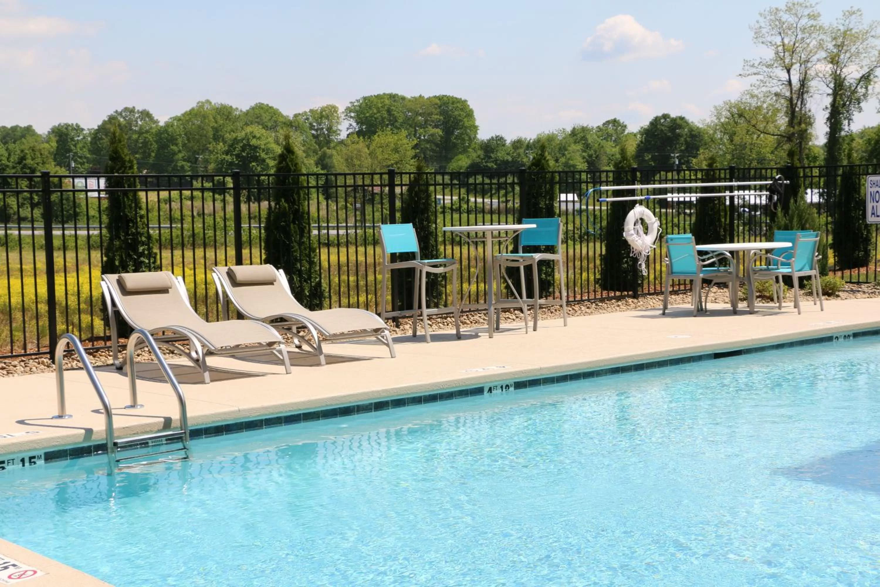 Swimming pool in Holiday Inn Express & Suites - Hendersonville SE - Flat Rock by IHG