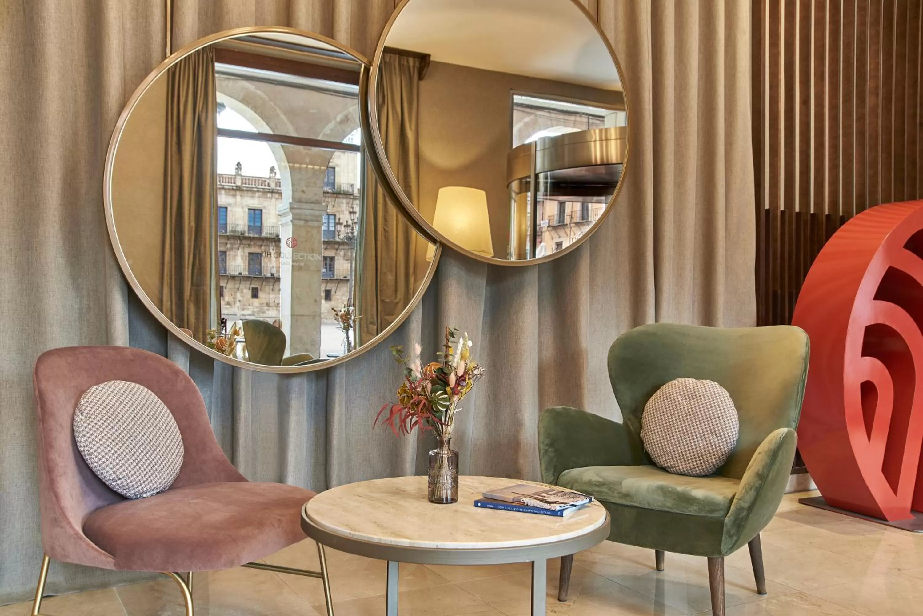 Lobby or reception in NH Collection León Plaza Mayor