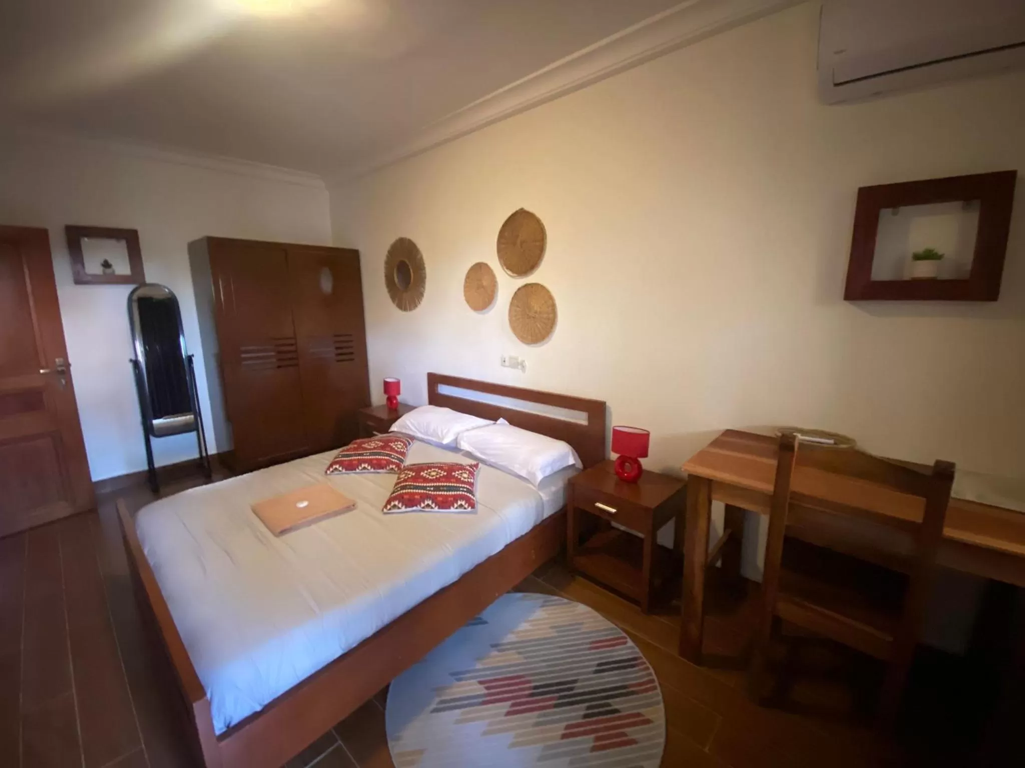 Bed in L'Oasis Guesthouse