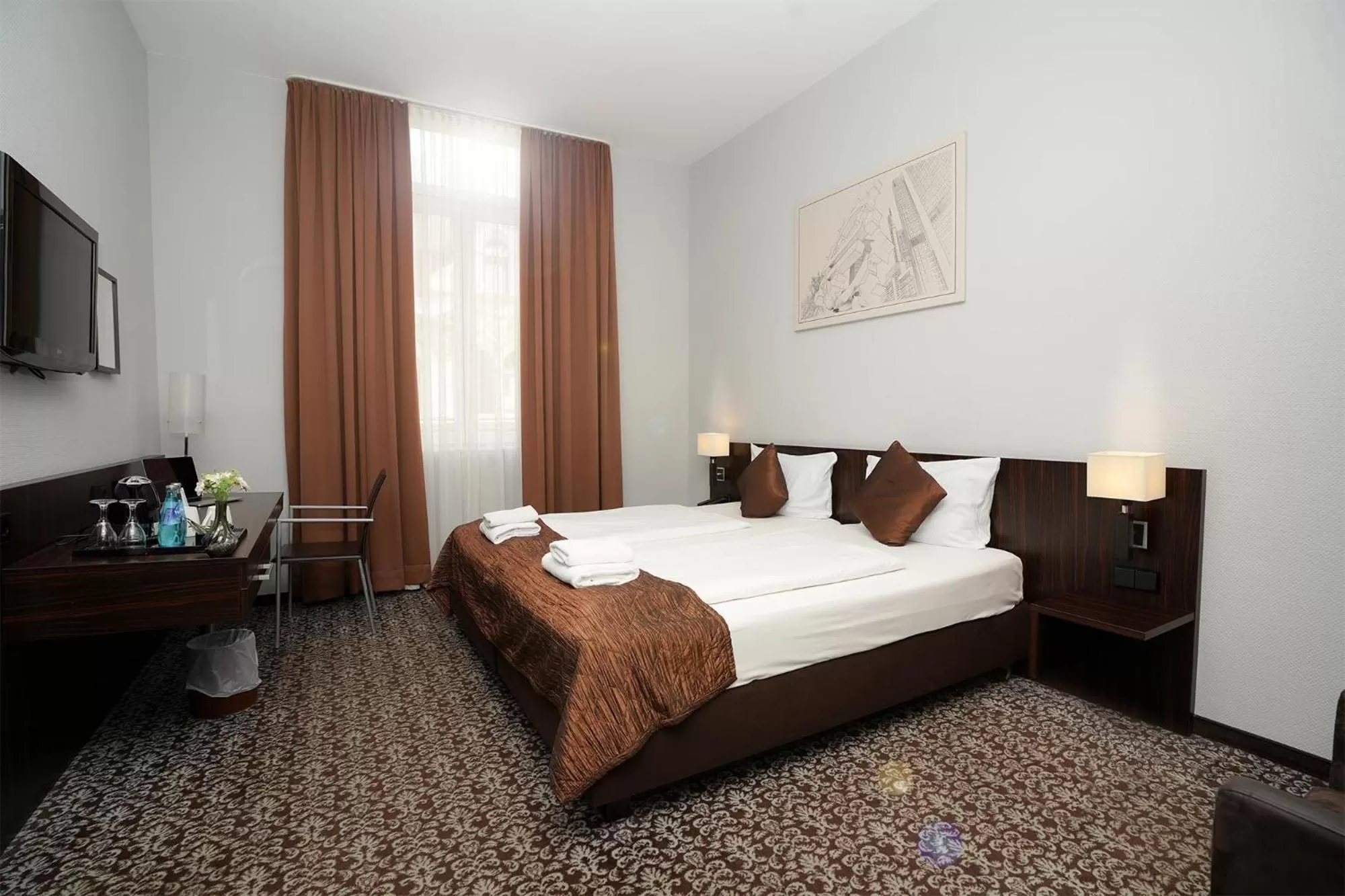 Bed in The Atrium Hotel