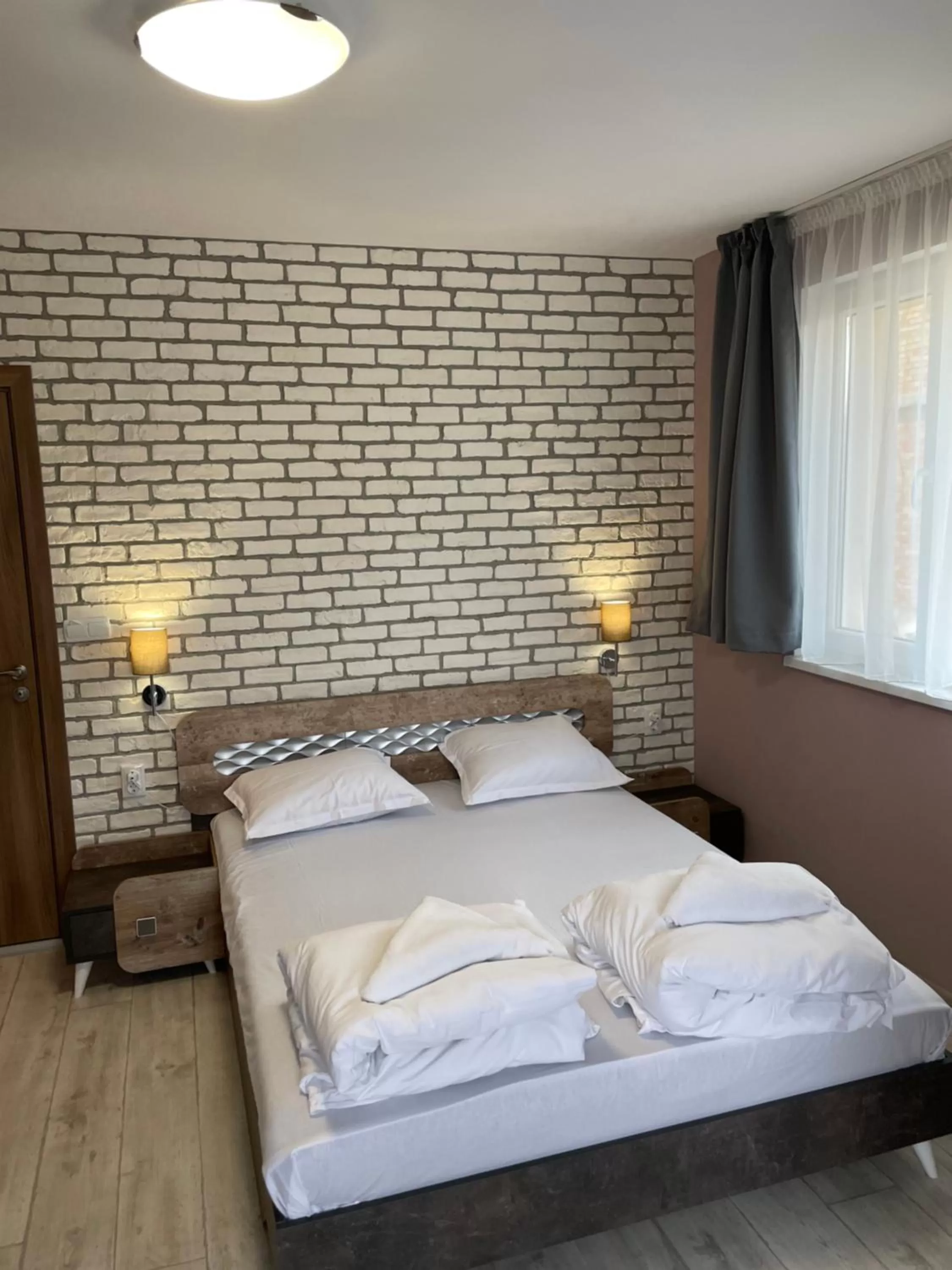 Bed in Family Hotel Malibu