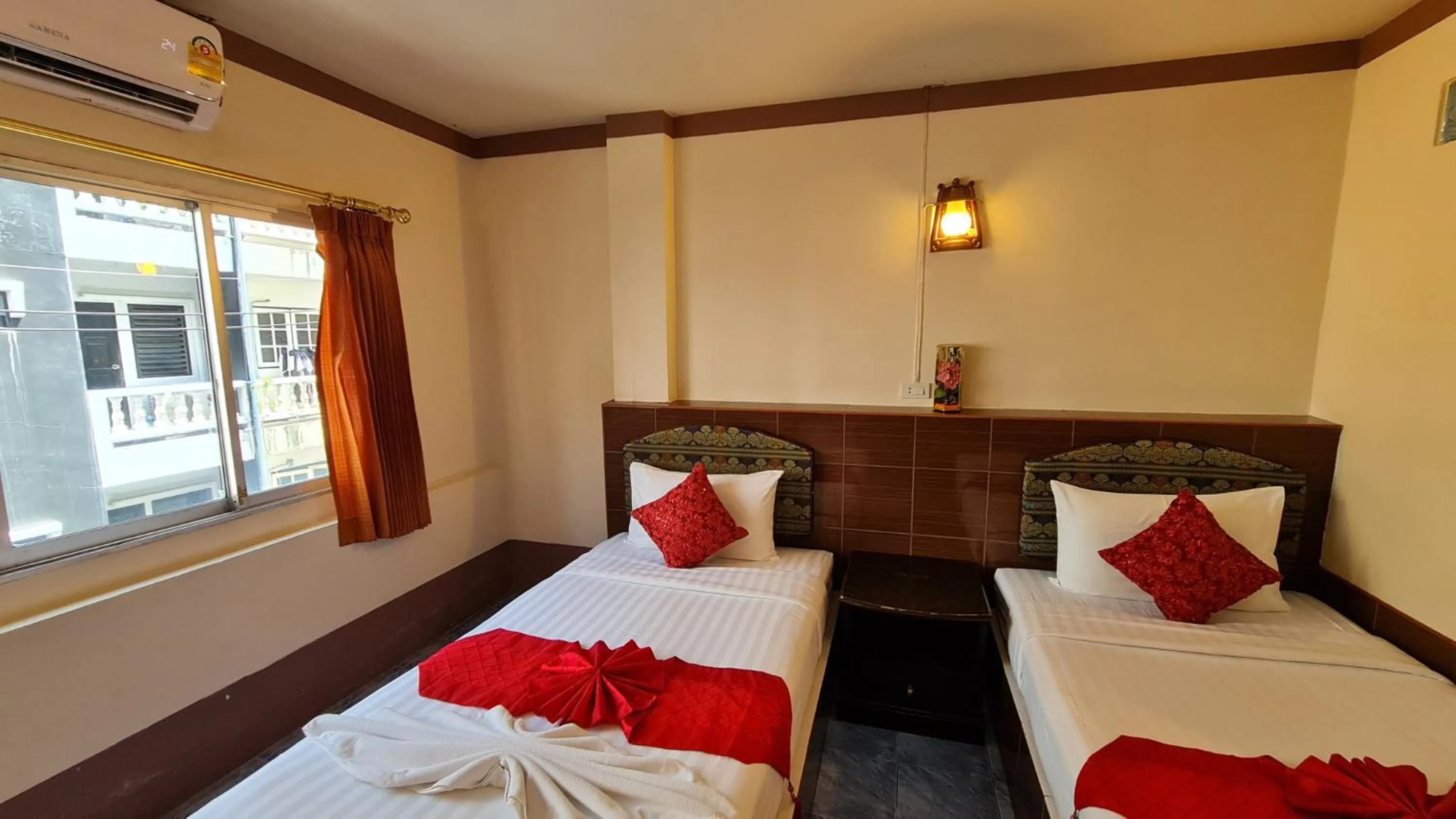 Bed in Vech Guesthouse Patong