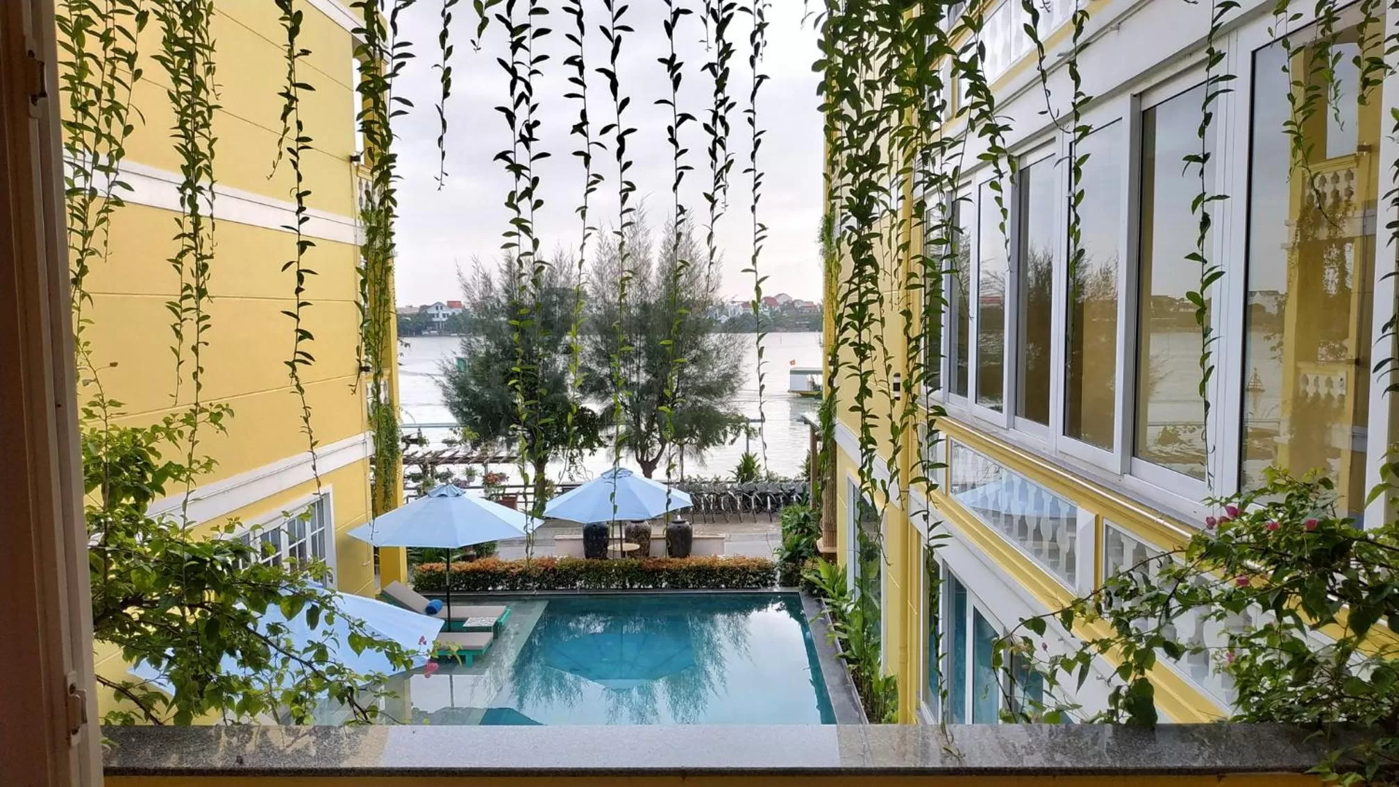 Pool View in TRIPLE Riverside Villa Hotel HoiAn