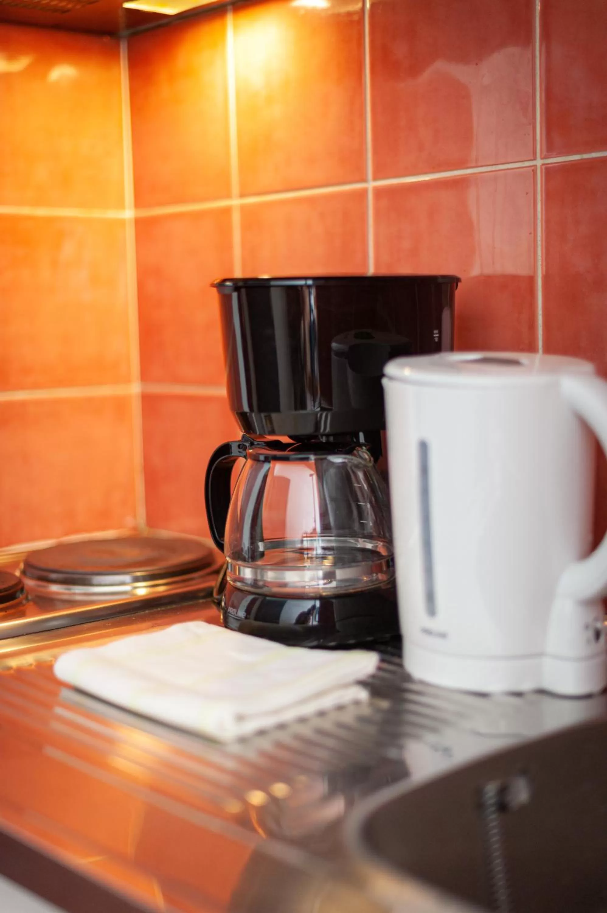 Kitchen or kitchenette in Apparthotel Privilodges Lyon Lumière