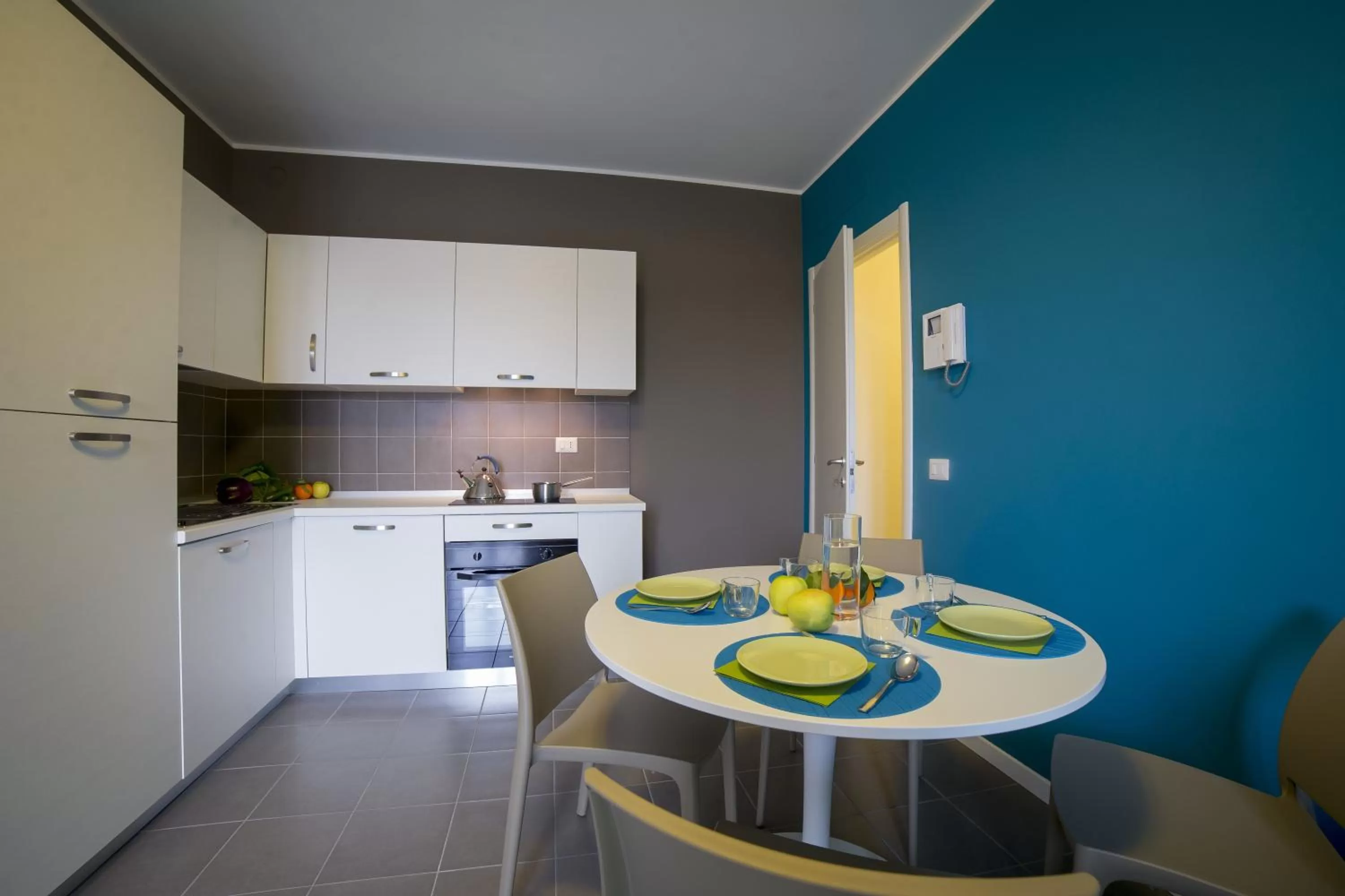 Kitchen or kitchenette in Aurum Aparthotels Pianell 10