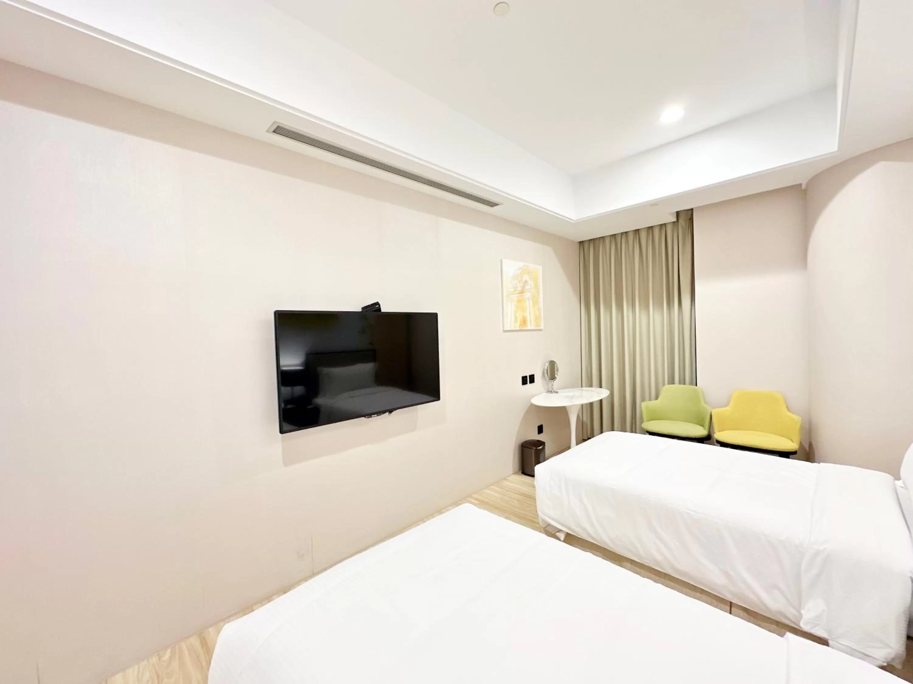 Bed in 台南星鑽國際商旅 Hua Hotel