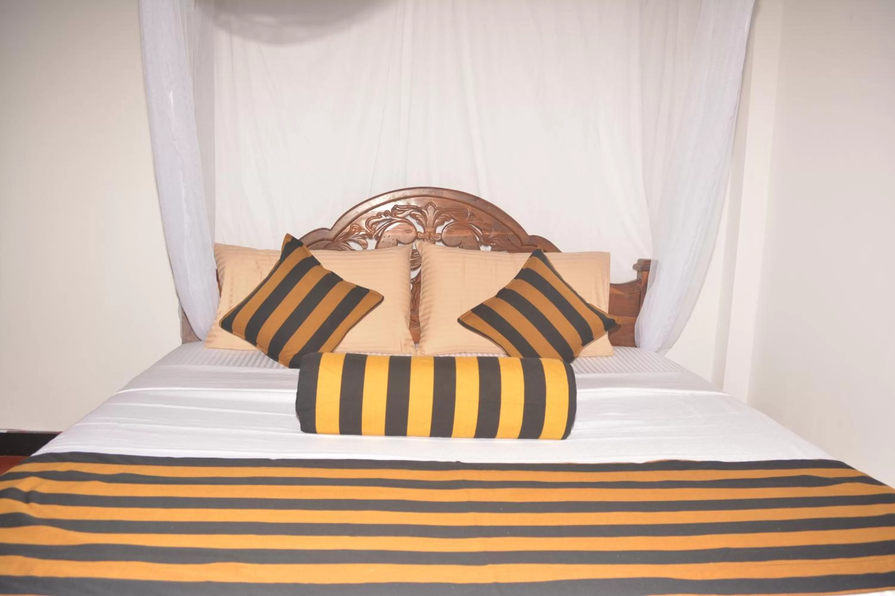 Bed in Ella River Face Inn