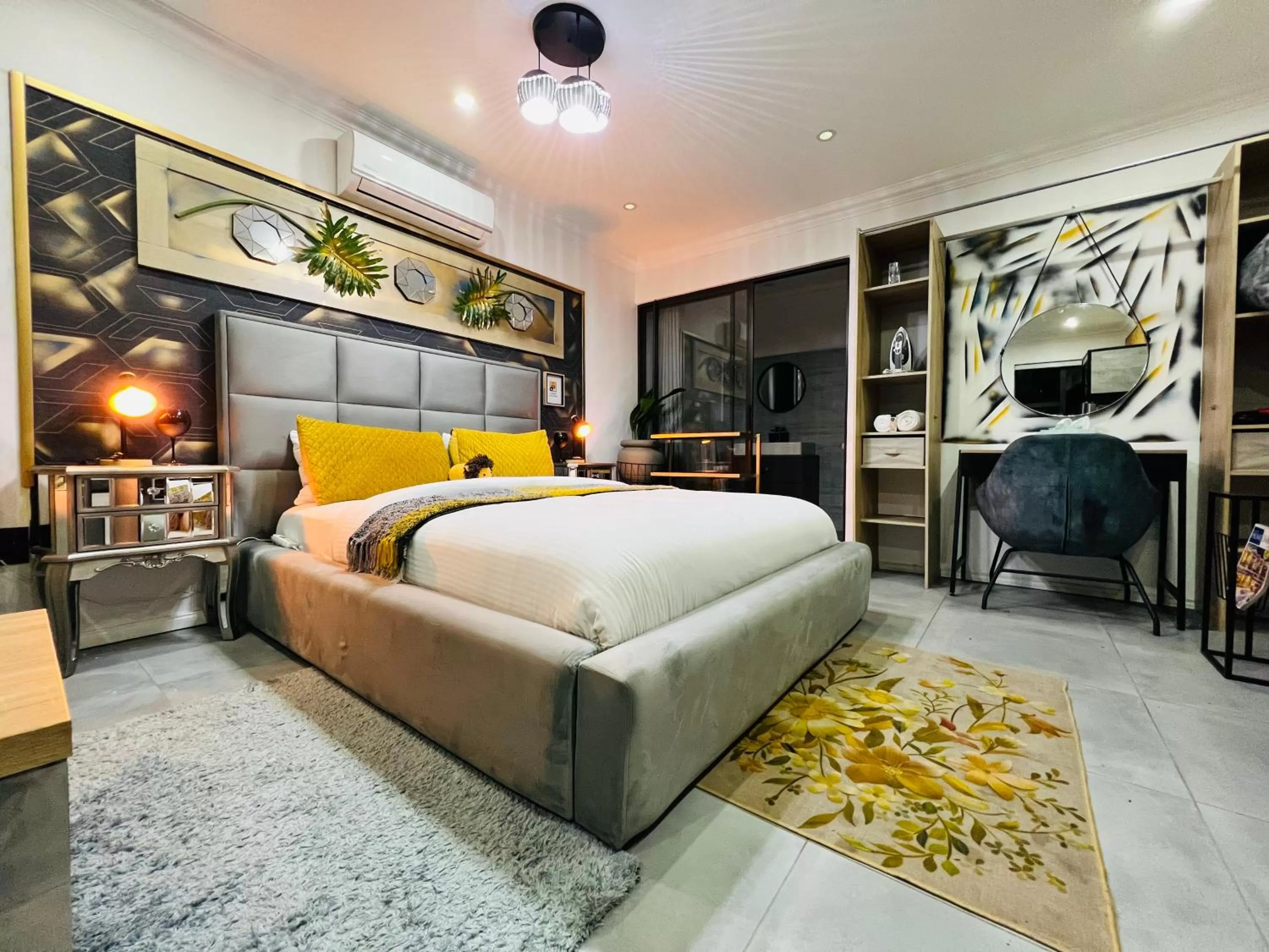 Photo of the whole room, Bed in 24 On Basil Inventive suites