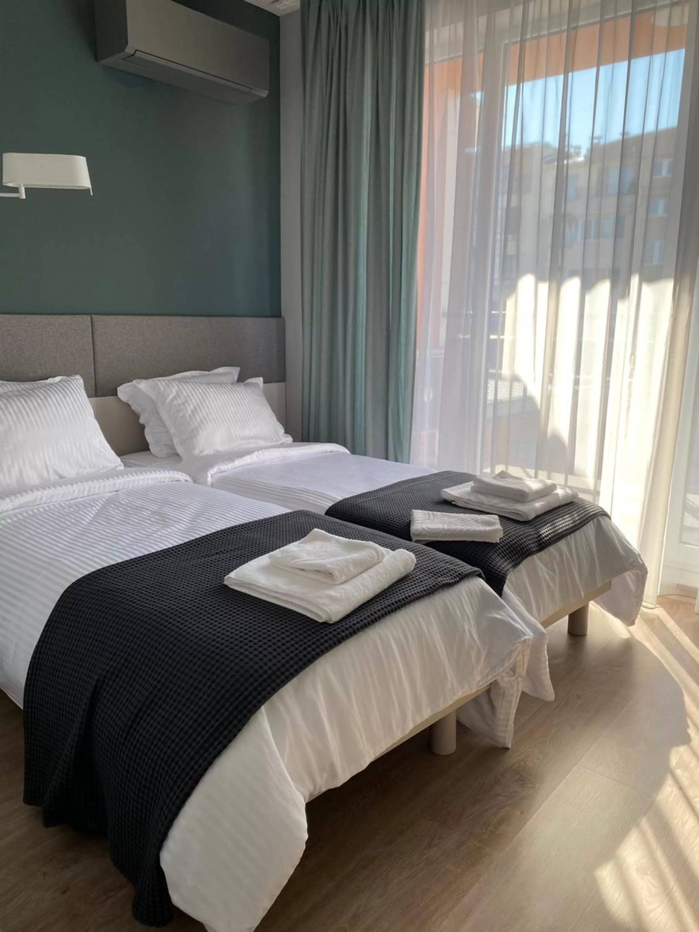 Bed in 7th Sense boutique apartments