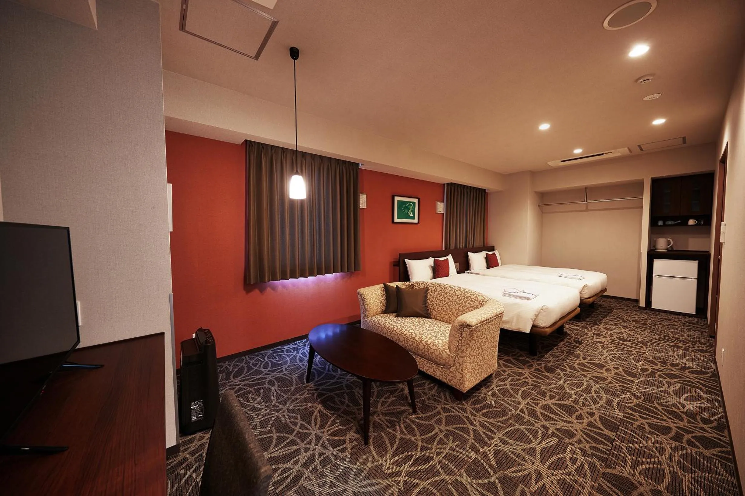 Bed in Y's Inn Naha Oroku Ekimae