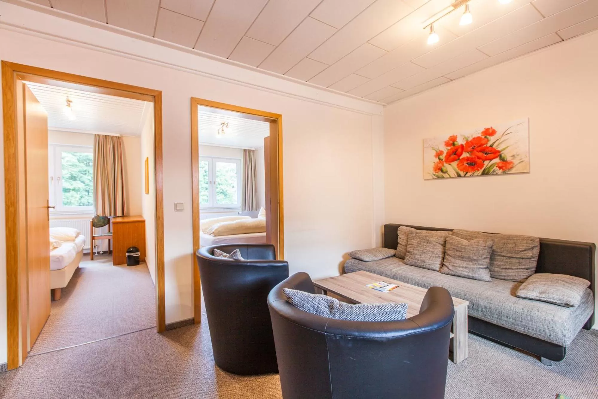 Living room, Bed in Sporthotel Wernigerode