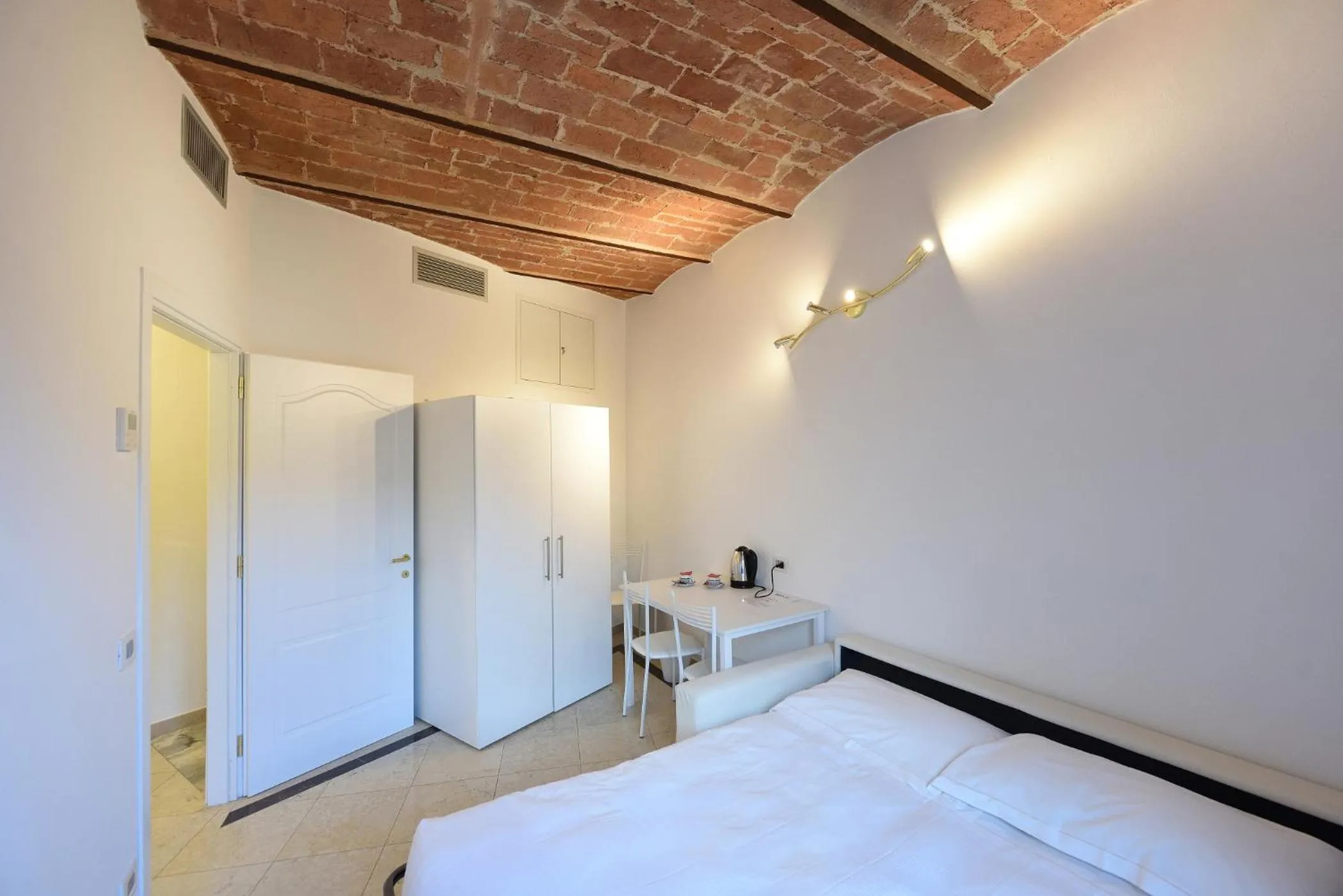 Bed in Relais La Corte di Cloris