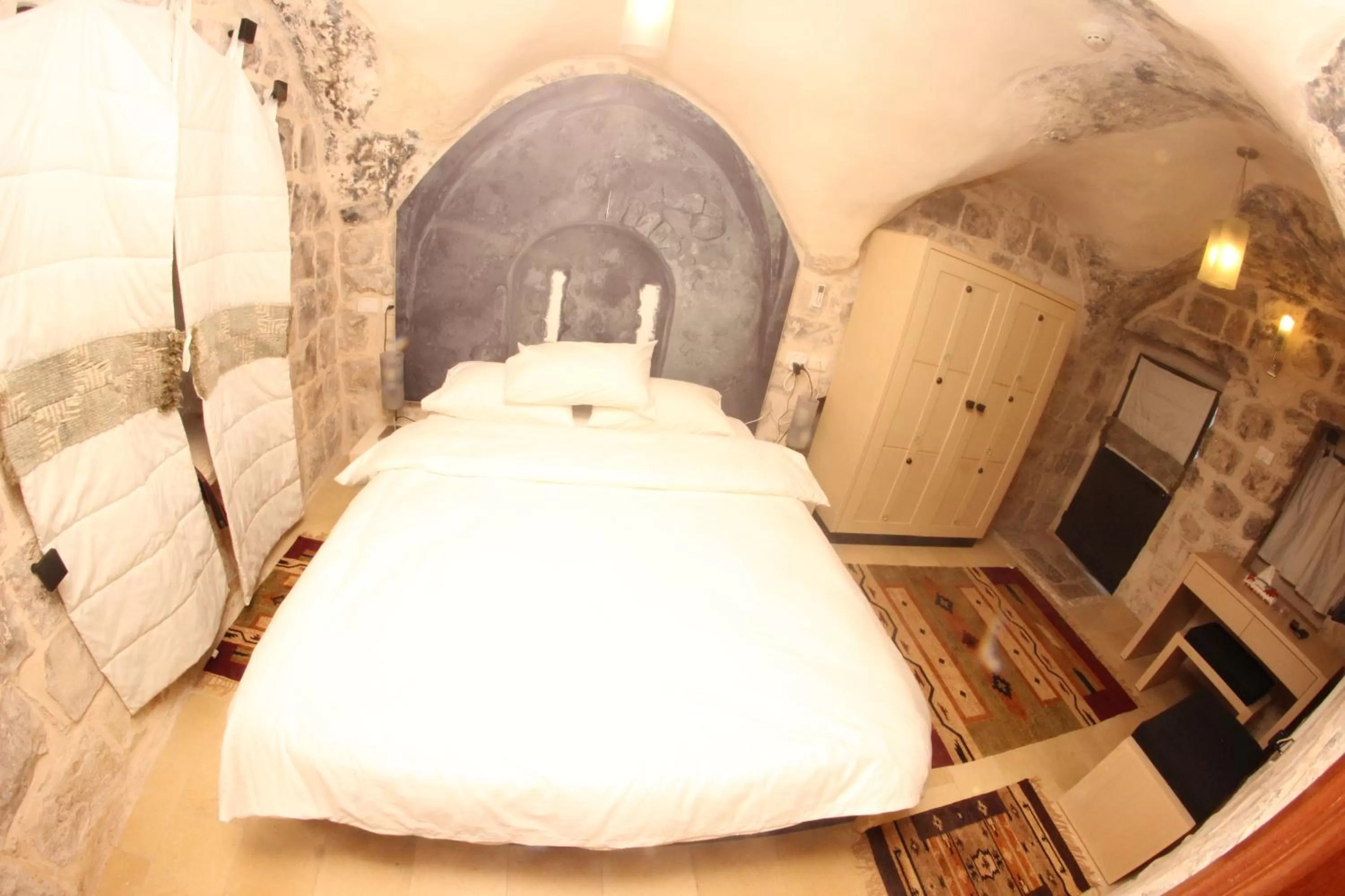 Bed in Khan Alwakala Hotel