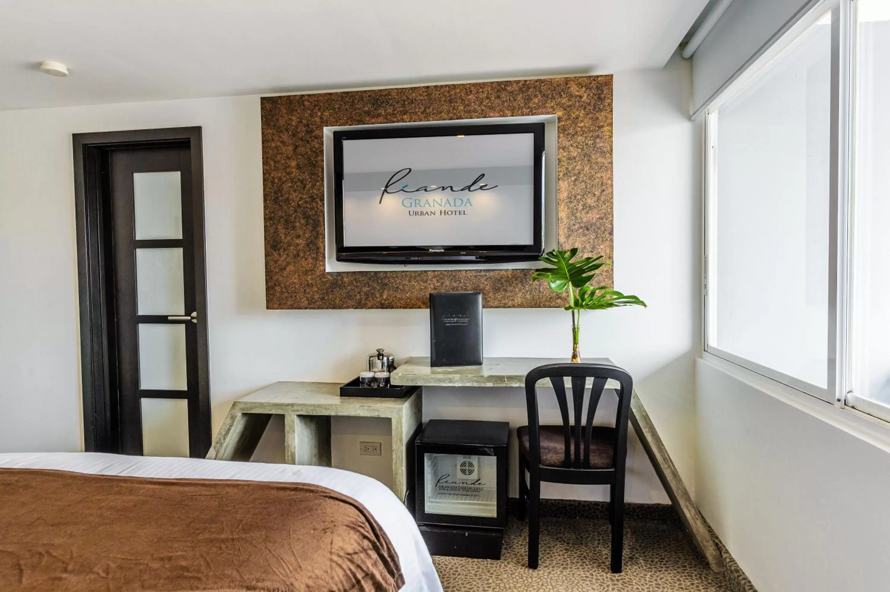 Bed in Riande Urban Hotel