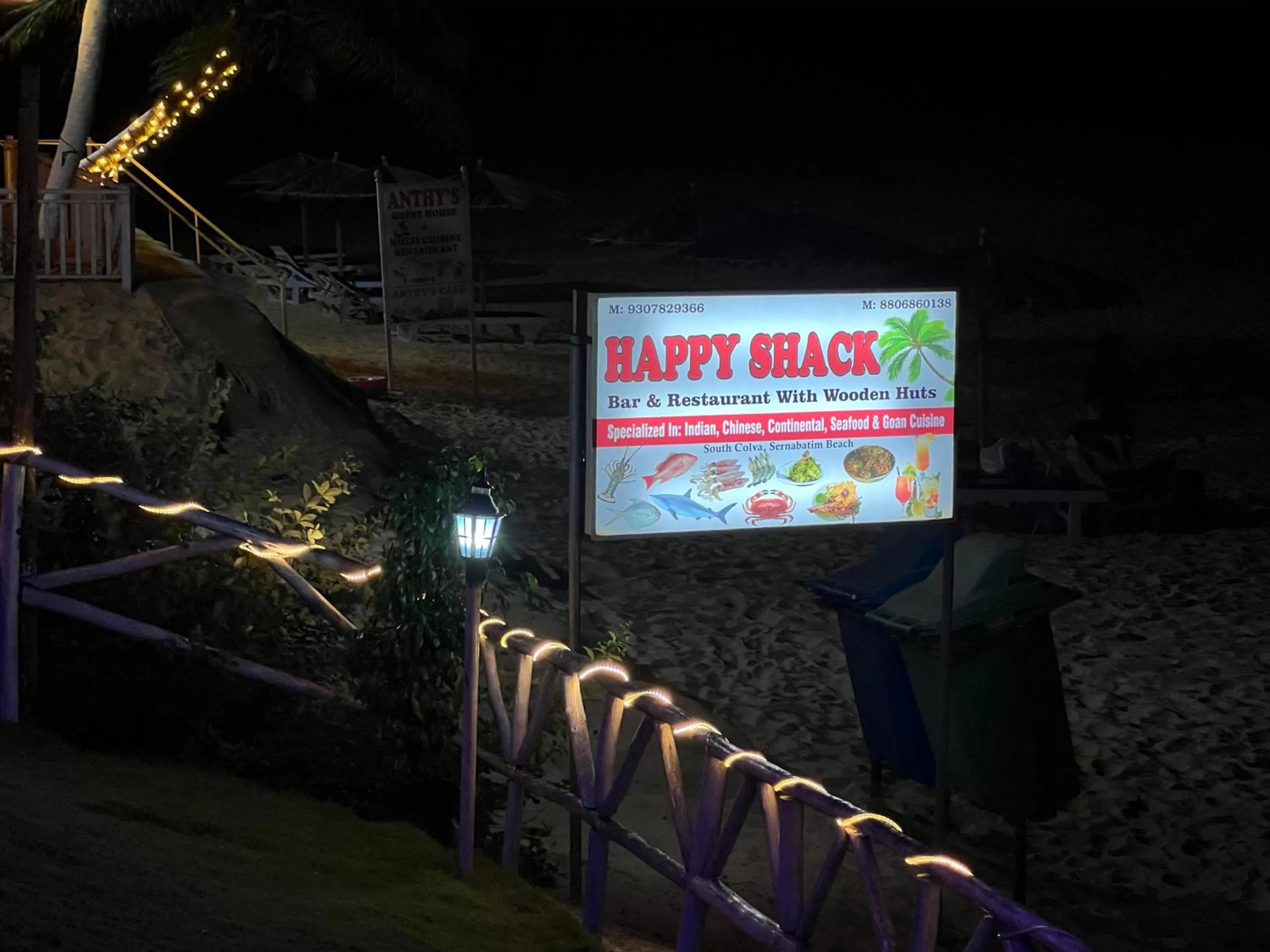Property logo or sign in Happy Shack Beach And Wooden Huts