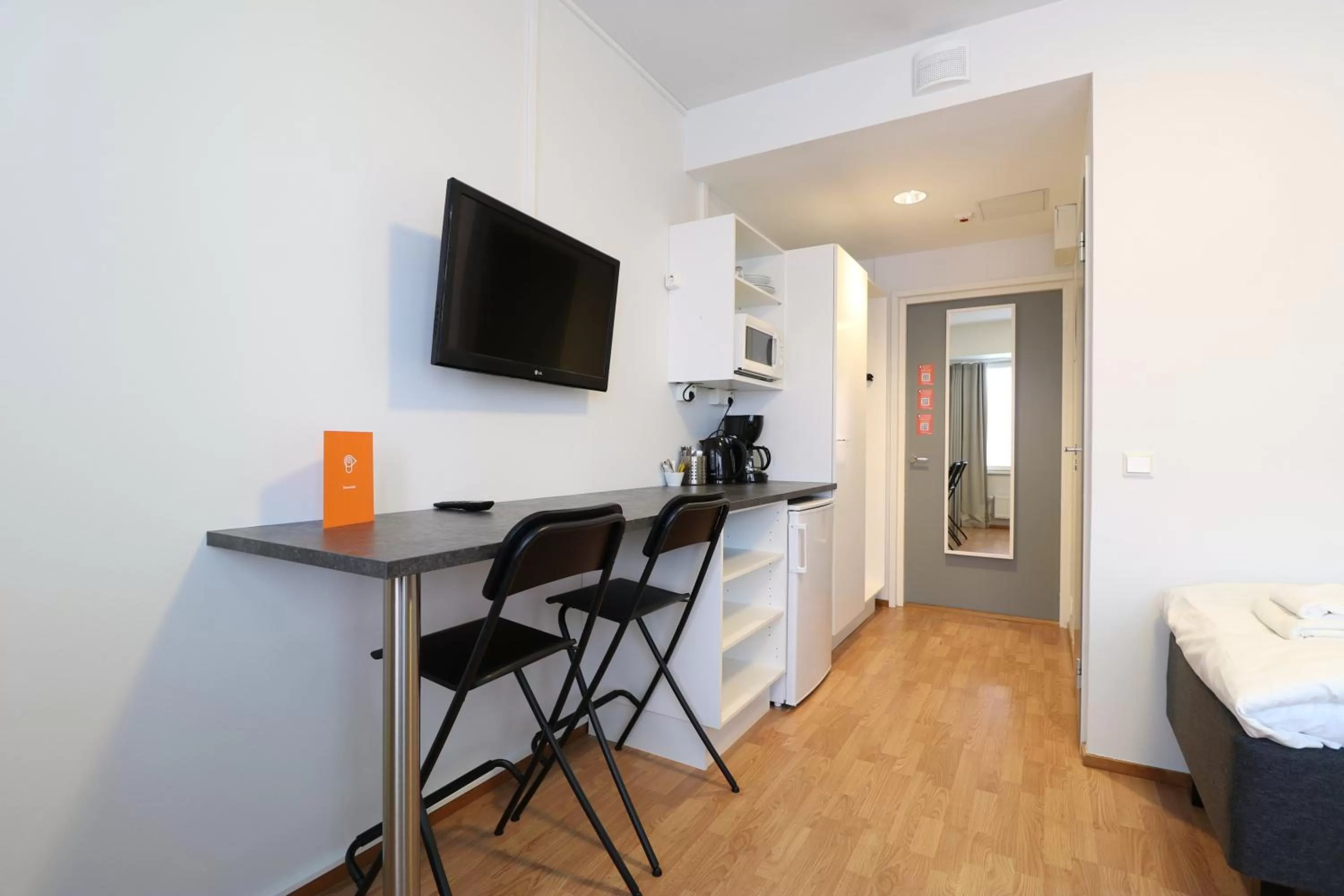 Kitchen or kitchenette in Forenom Aparthotel Helsinki Herttoniemi