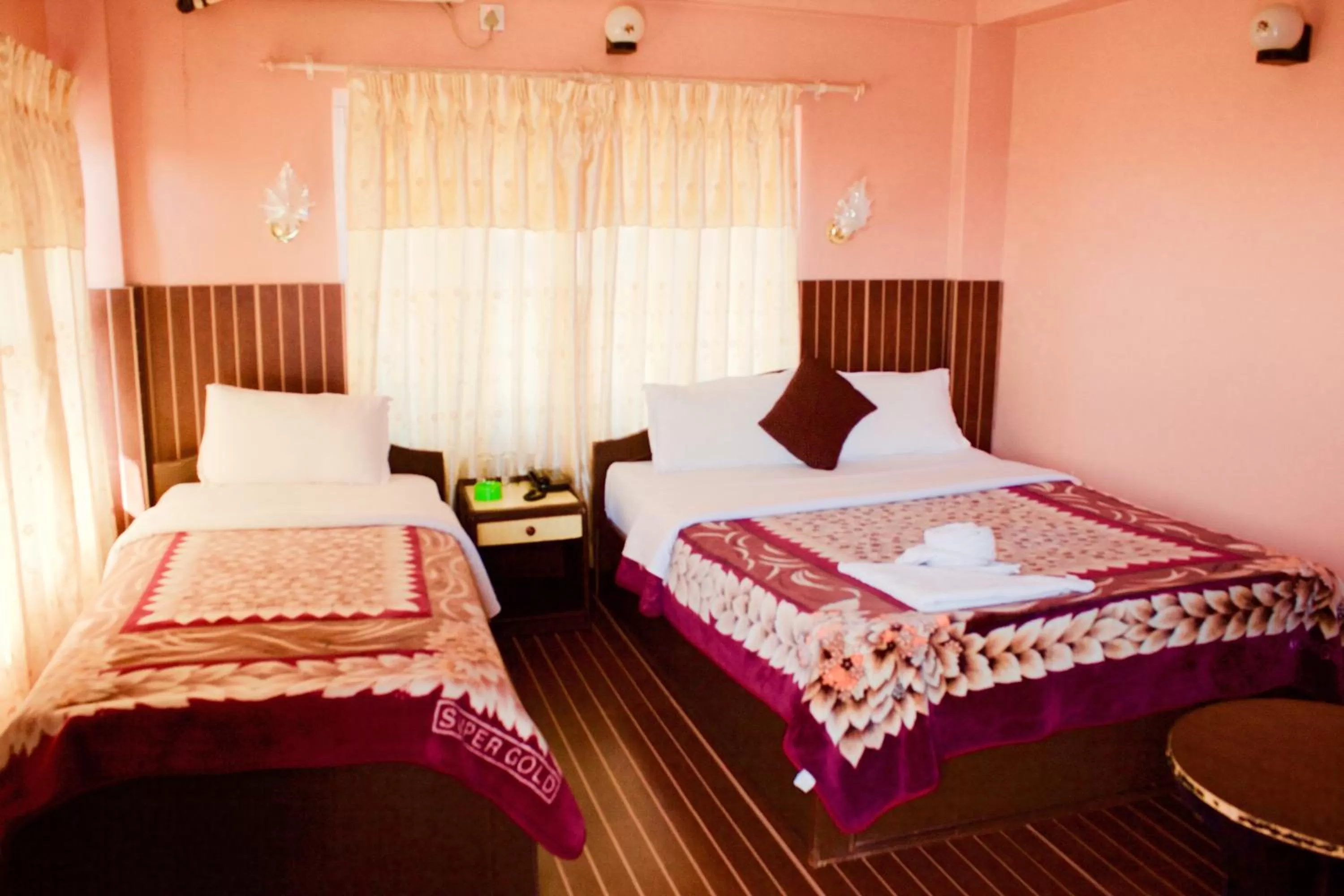 Bed in Hotel Himalayan Inn