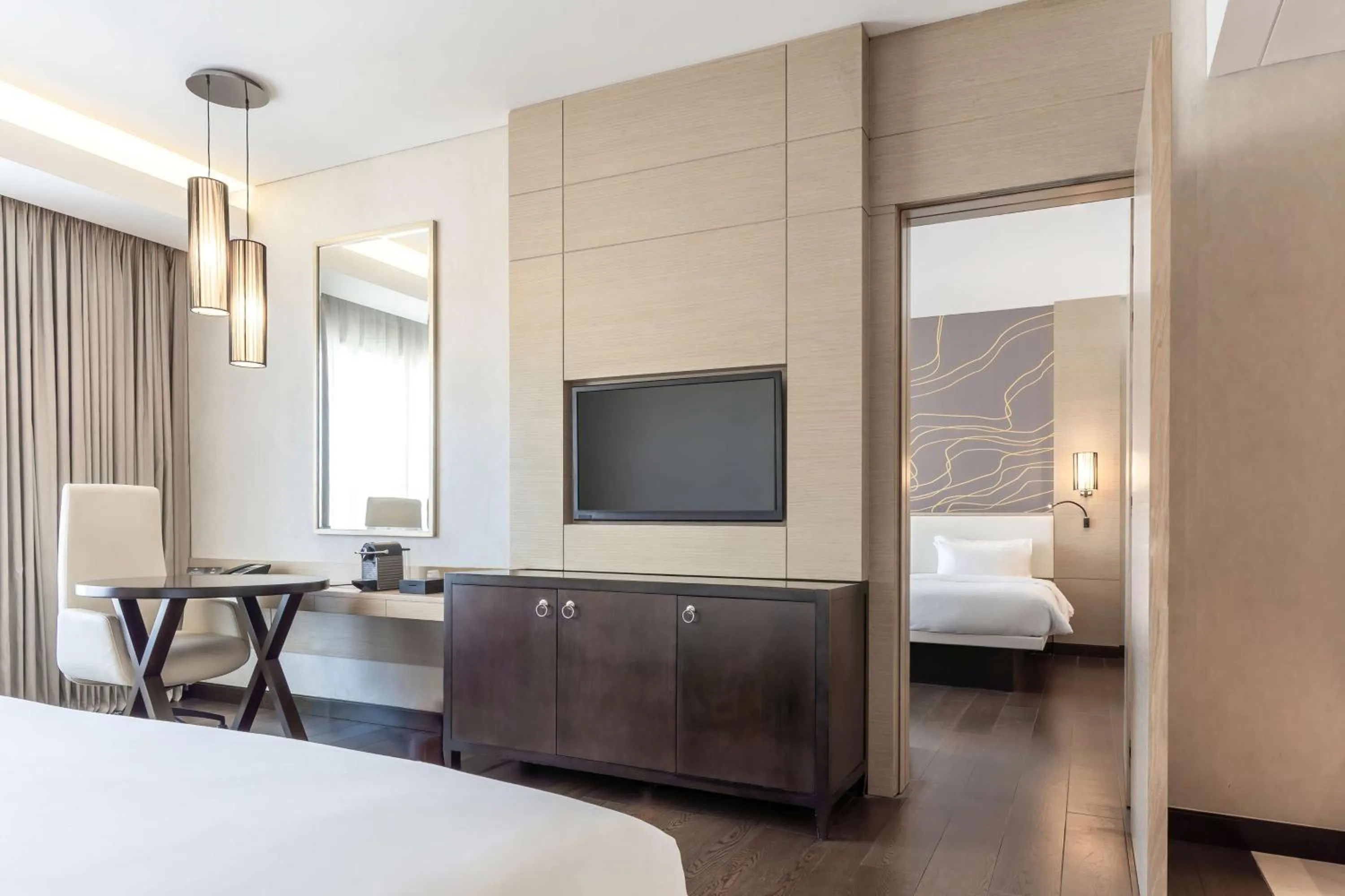 Photo of the whole room, Bed in Radisson Collection Muscat, Hormuz Grand