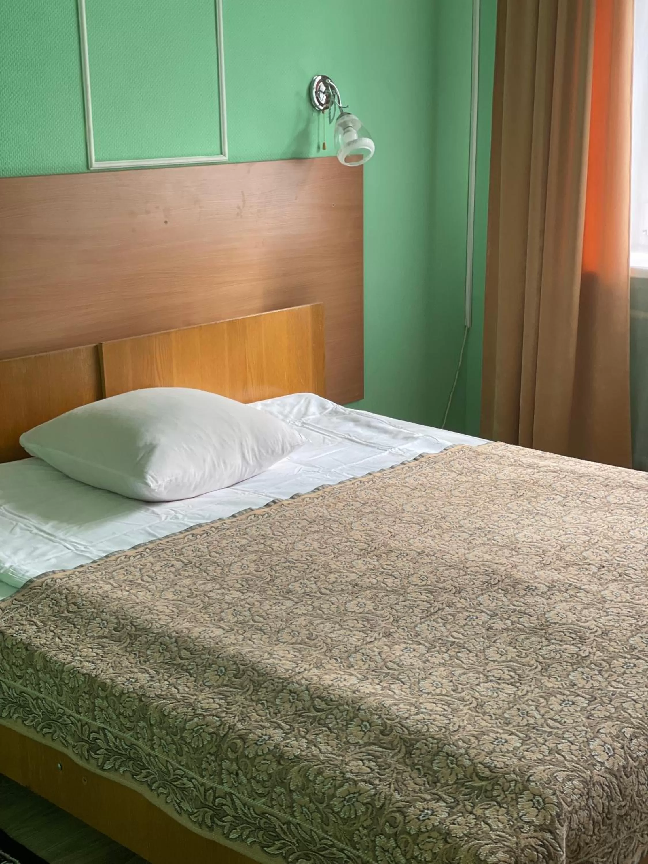 Bed in Hotel Prydesnyansky