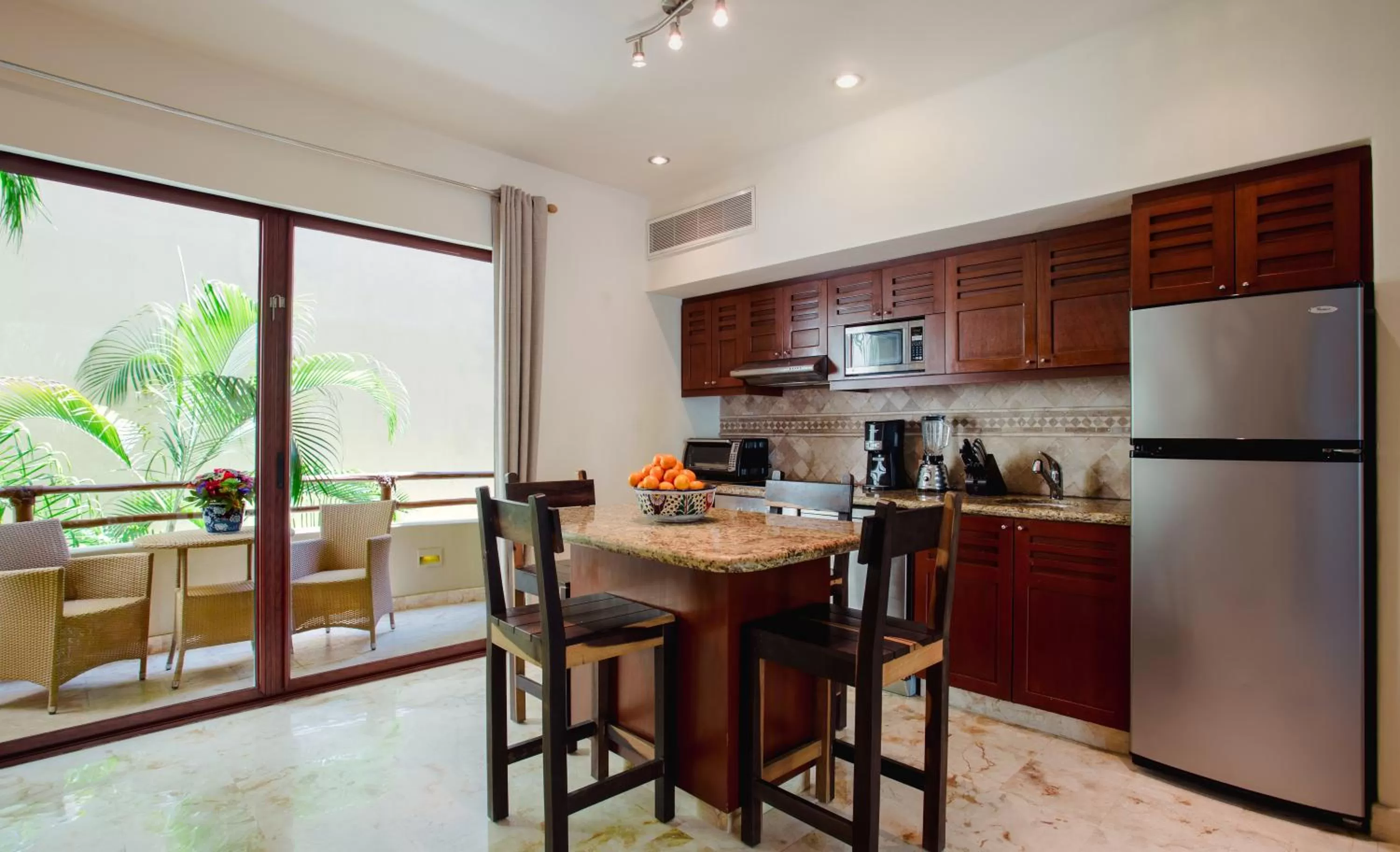 Kitchen or kitchenette in Maya Villa Condo Hotel and Beachclub