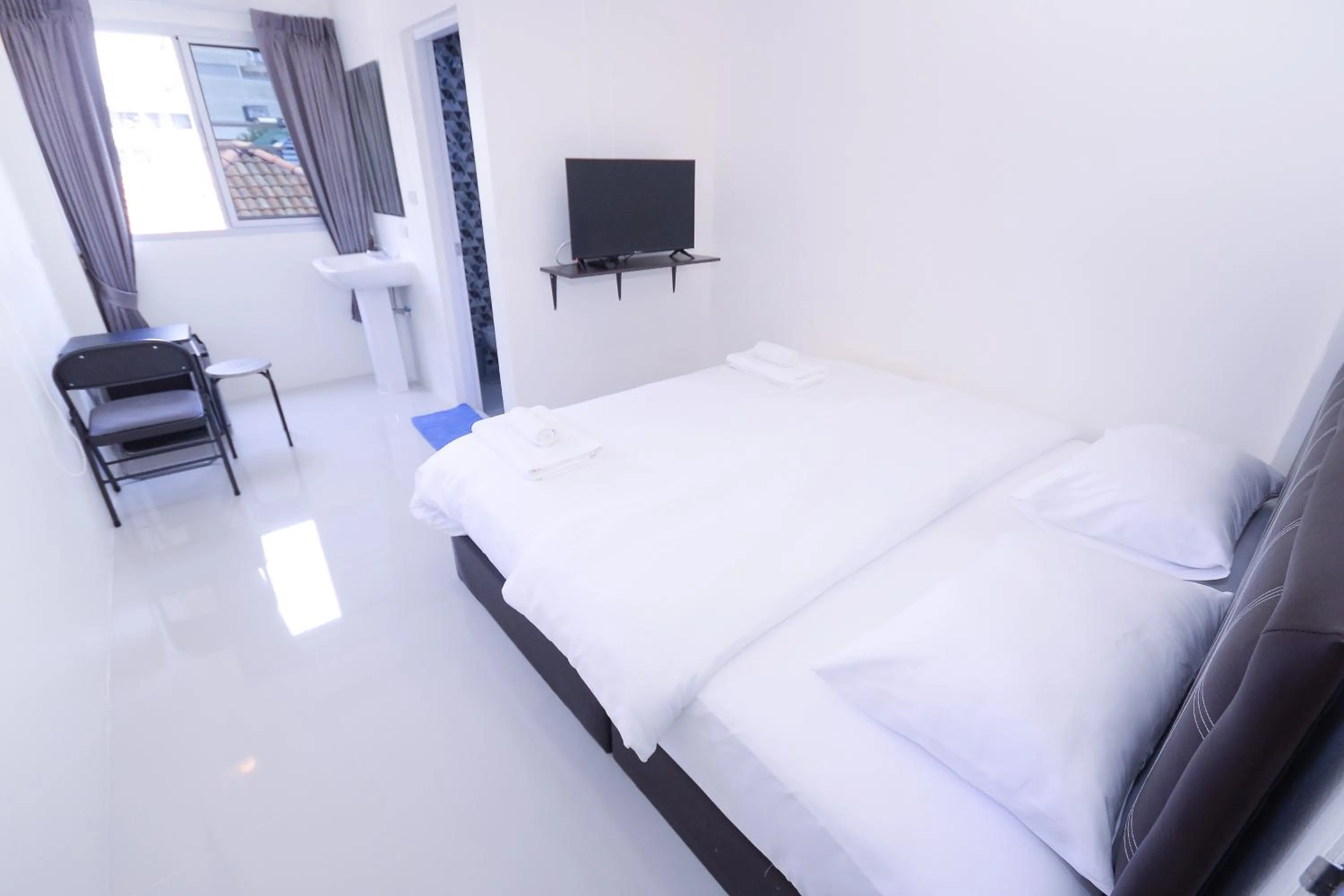 Bed in U-need Guesthouse95