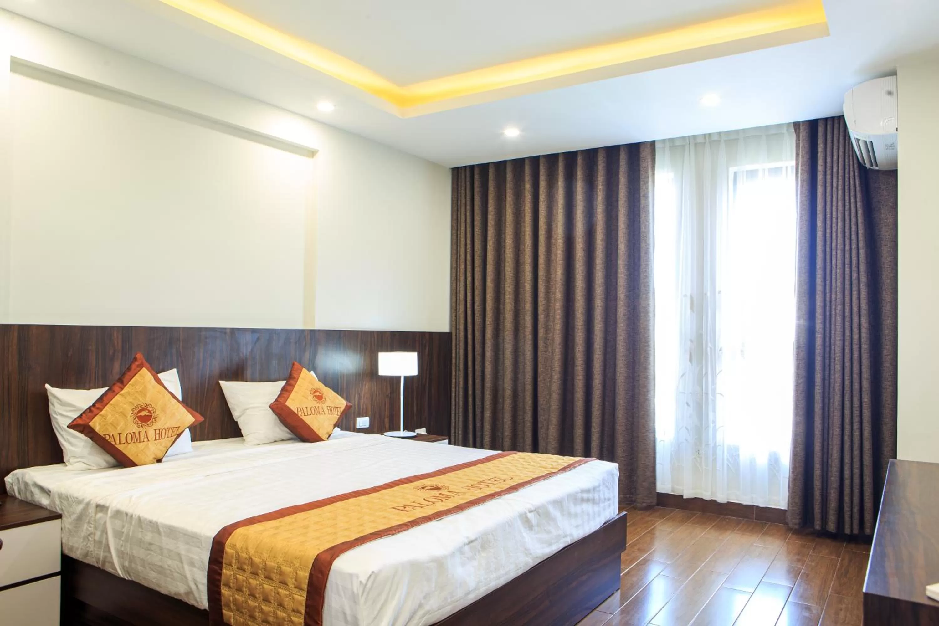 Bed in Paloma Hotel & Apartment