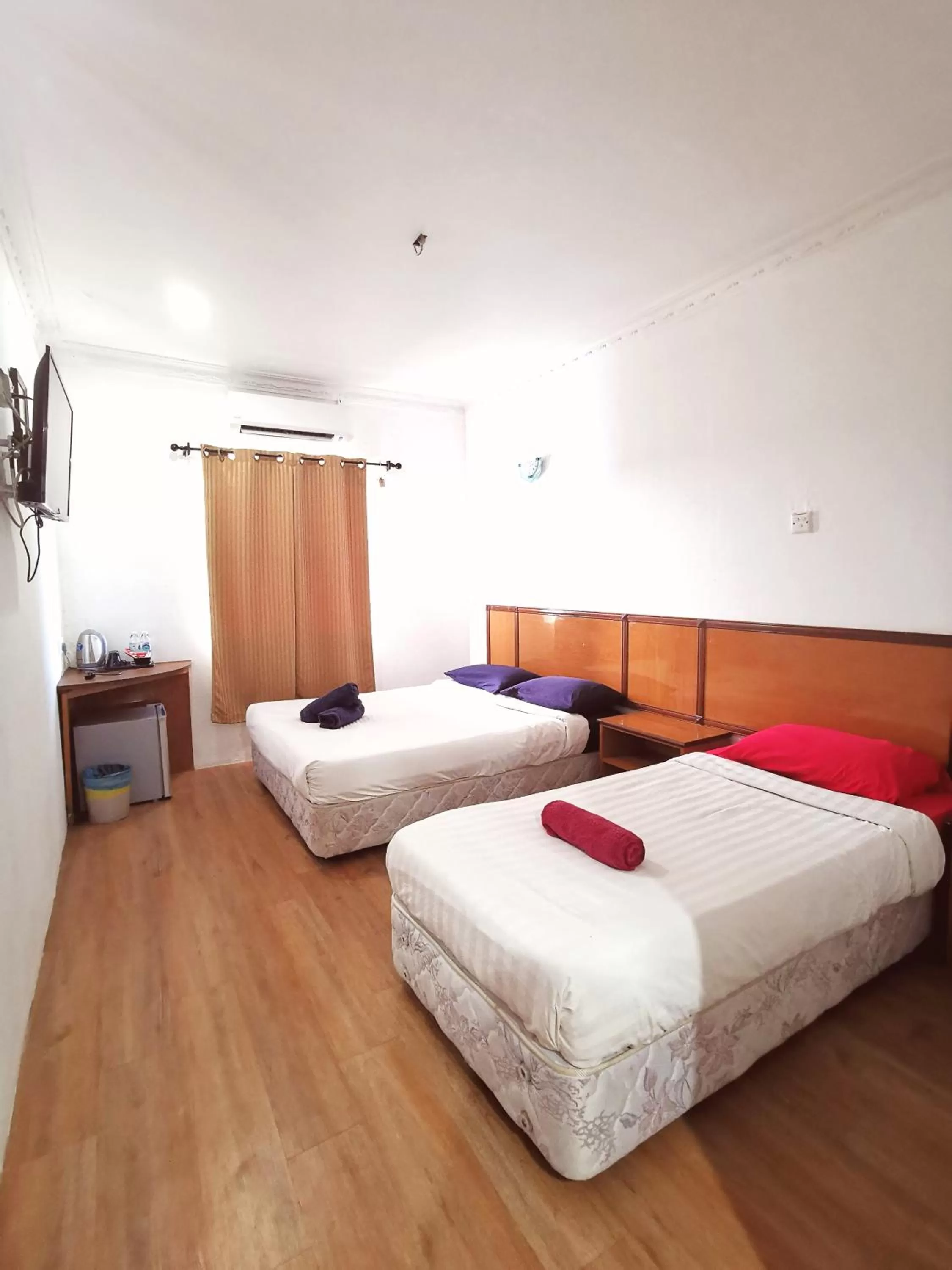 Bed in THE ZULEY HERITAGE HOTEL