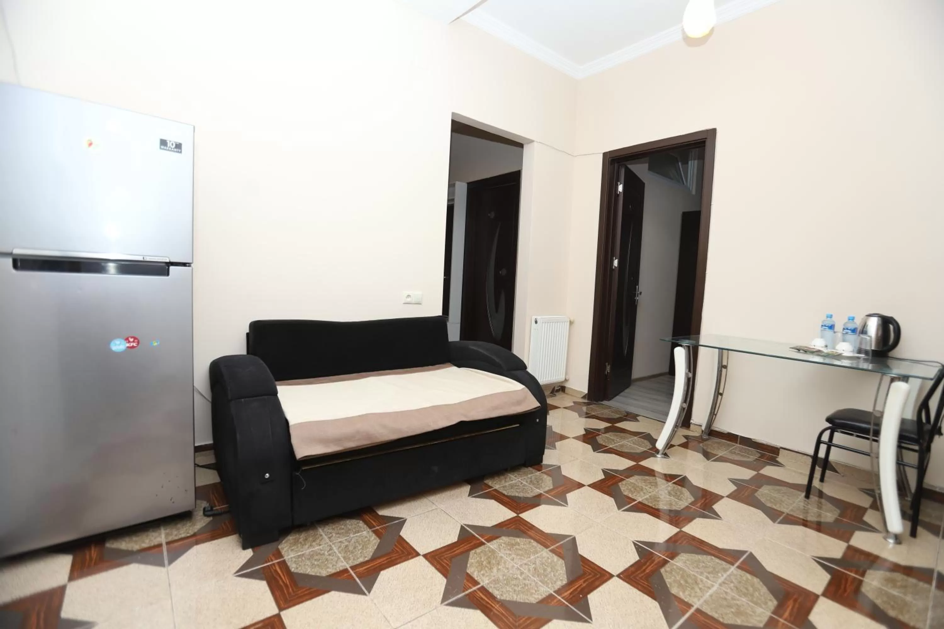 Seating area, Bed in The K Tbilisi