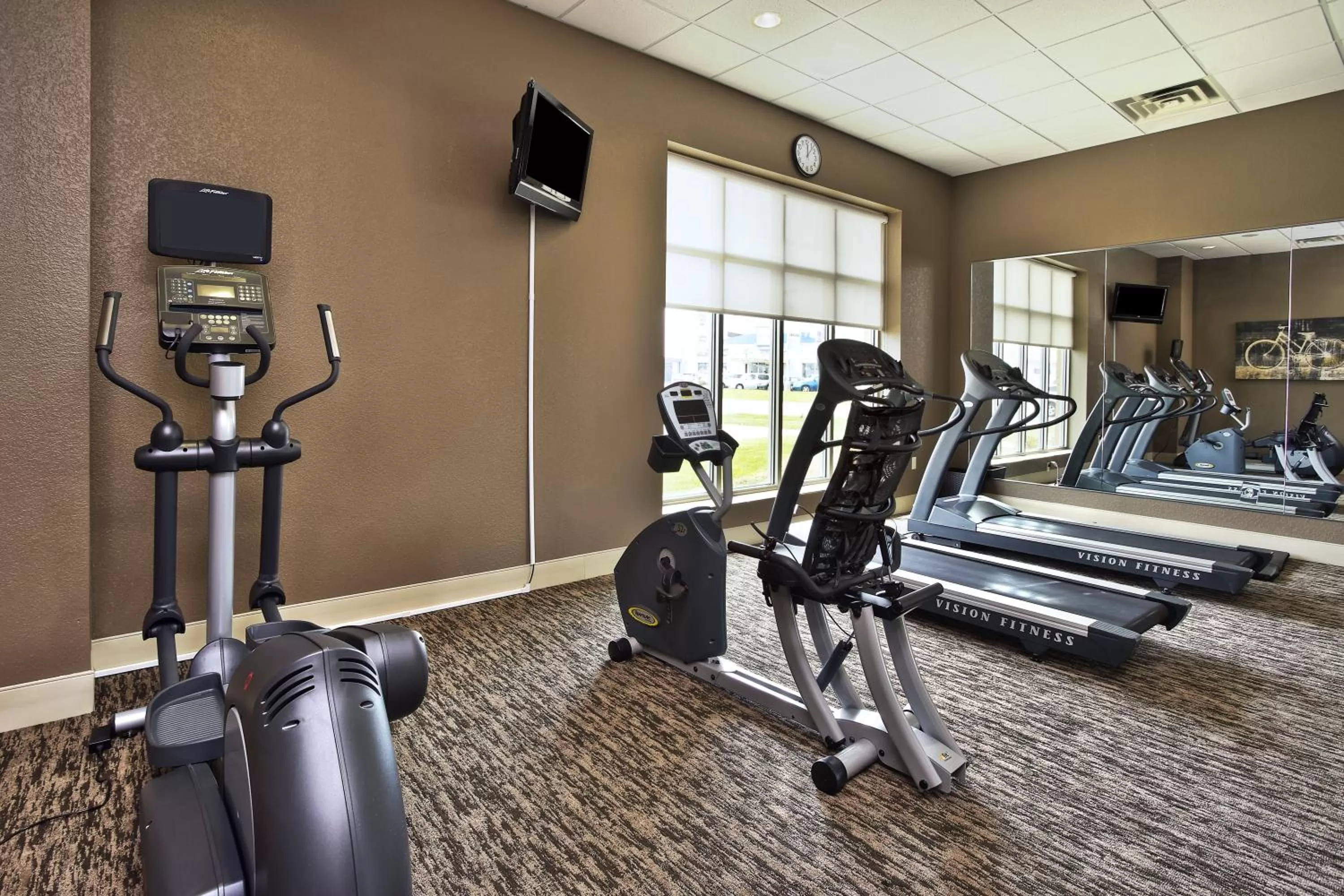 Fitness centre/facilities in Holiday Inn & Suites Green Bay Stadium by IHG