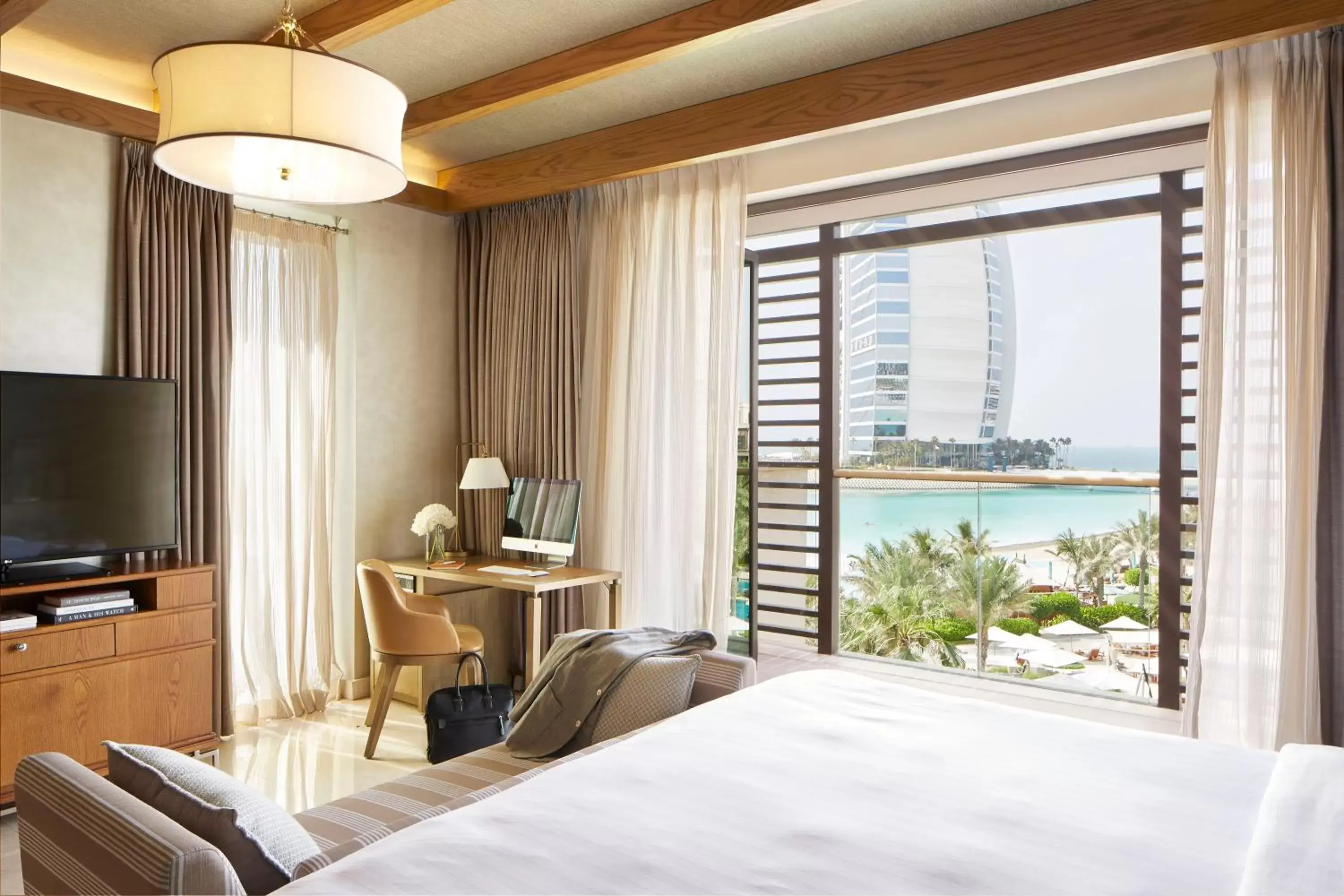 Burj View Suite - with airport transfers, suite benefits and beach club access in Jumeirah Al Naseem Dubai Burj View Suite - with airport transfers, suite benefits and beach club access in Jumeirah Al Naseem Dubai