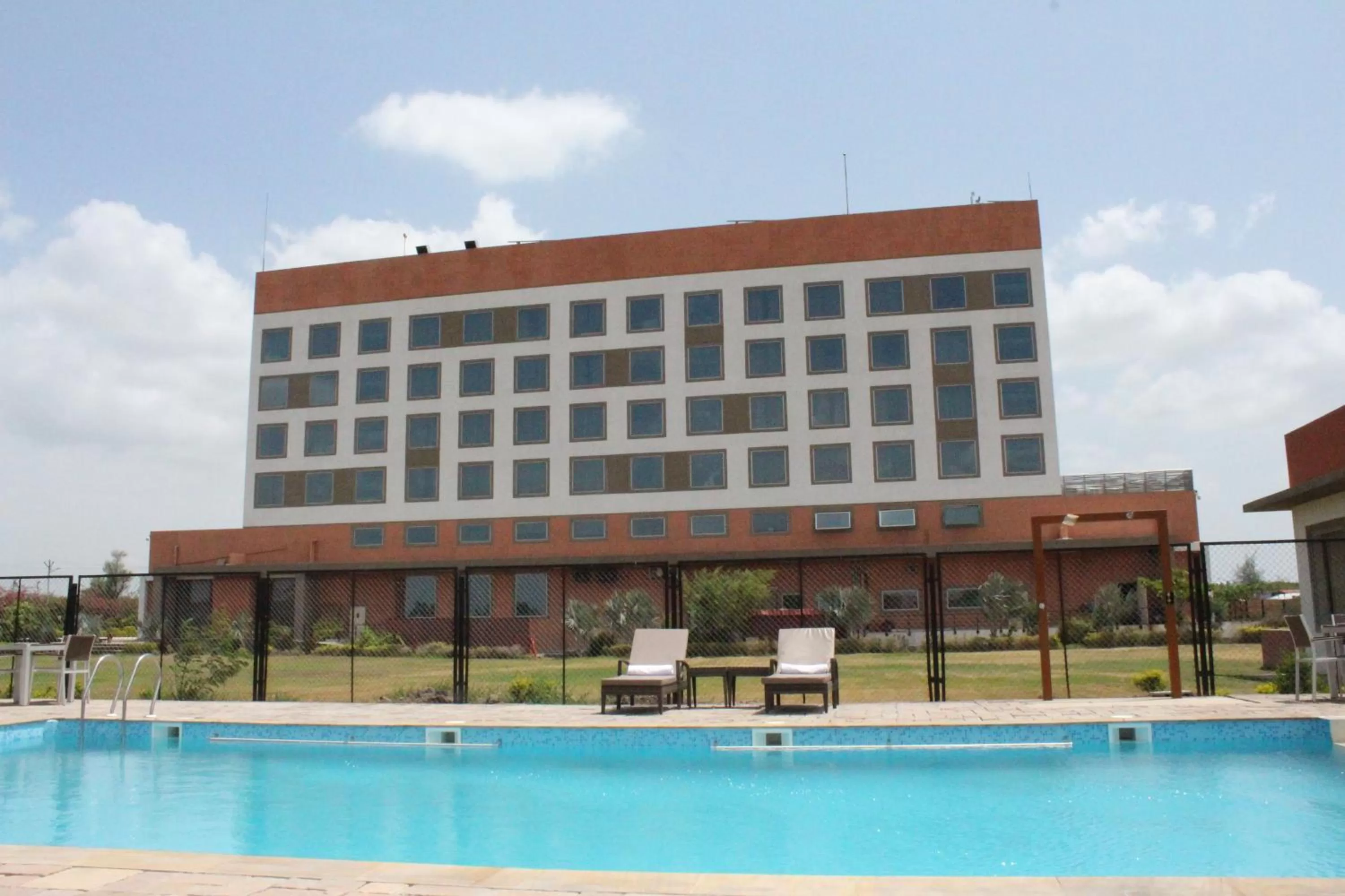 Swimming pool, Property Building in Jakson Inns