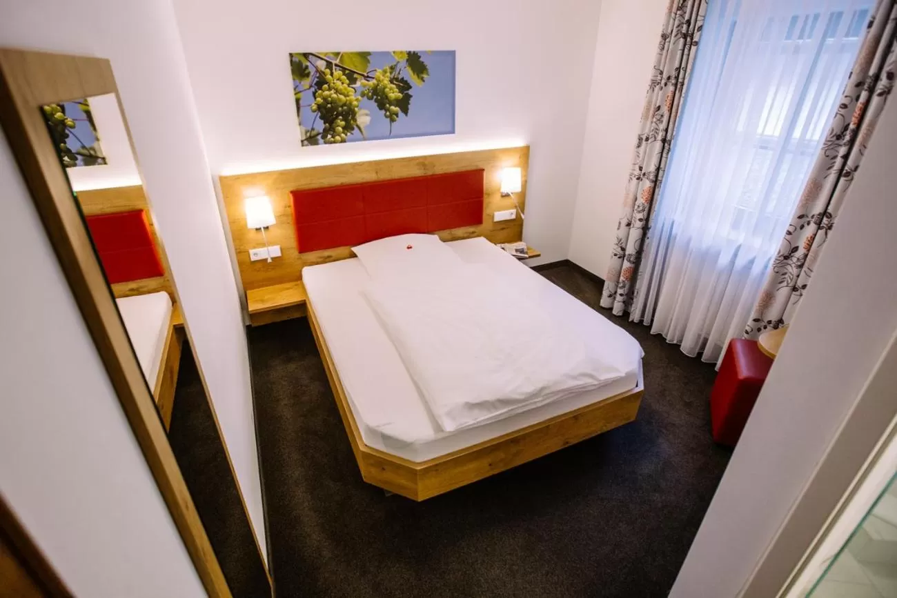 Bed in Hotel Restaurant Lamm Rosswag