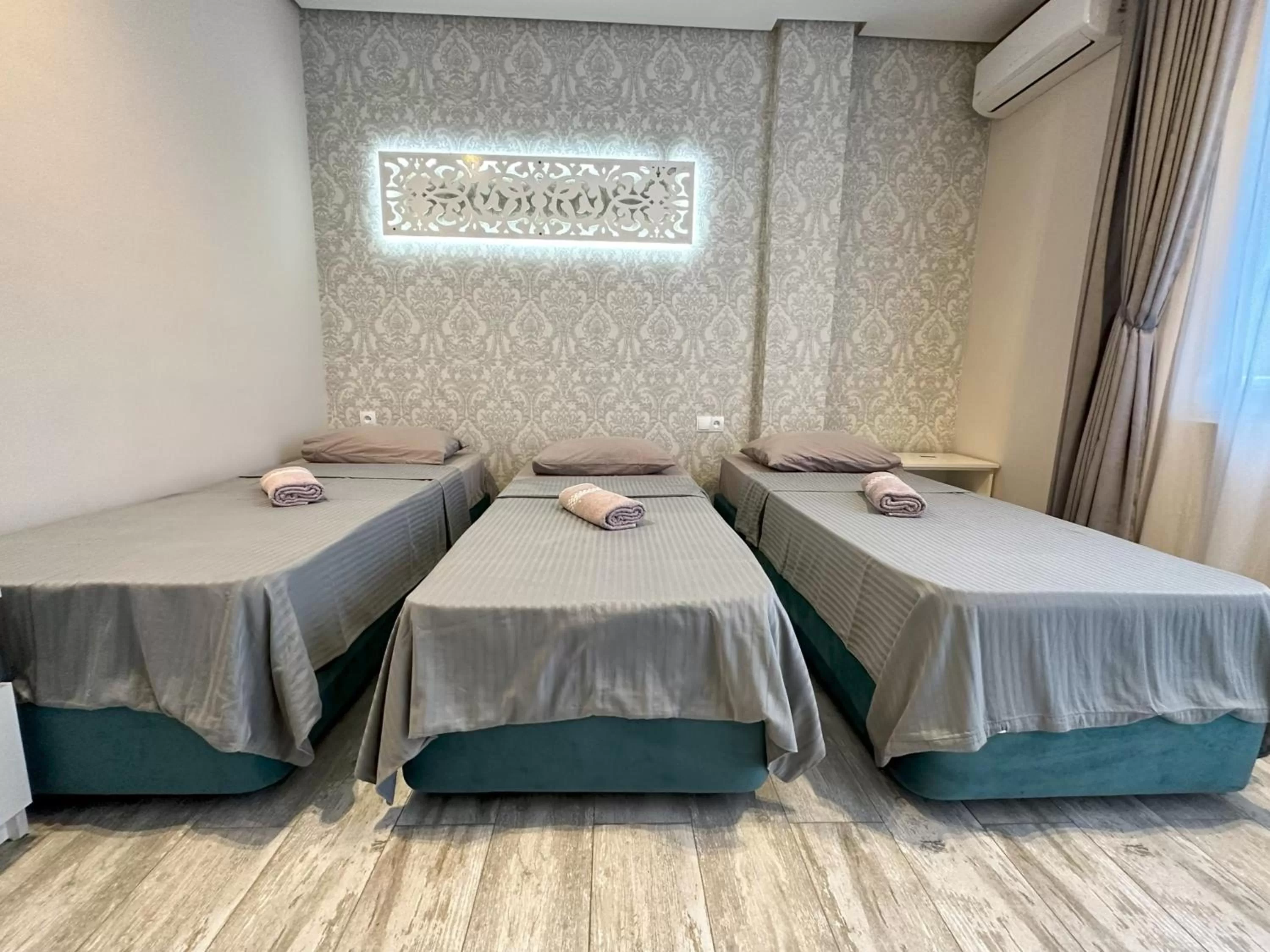 Photo of the whole room, Bed in National+