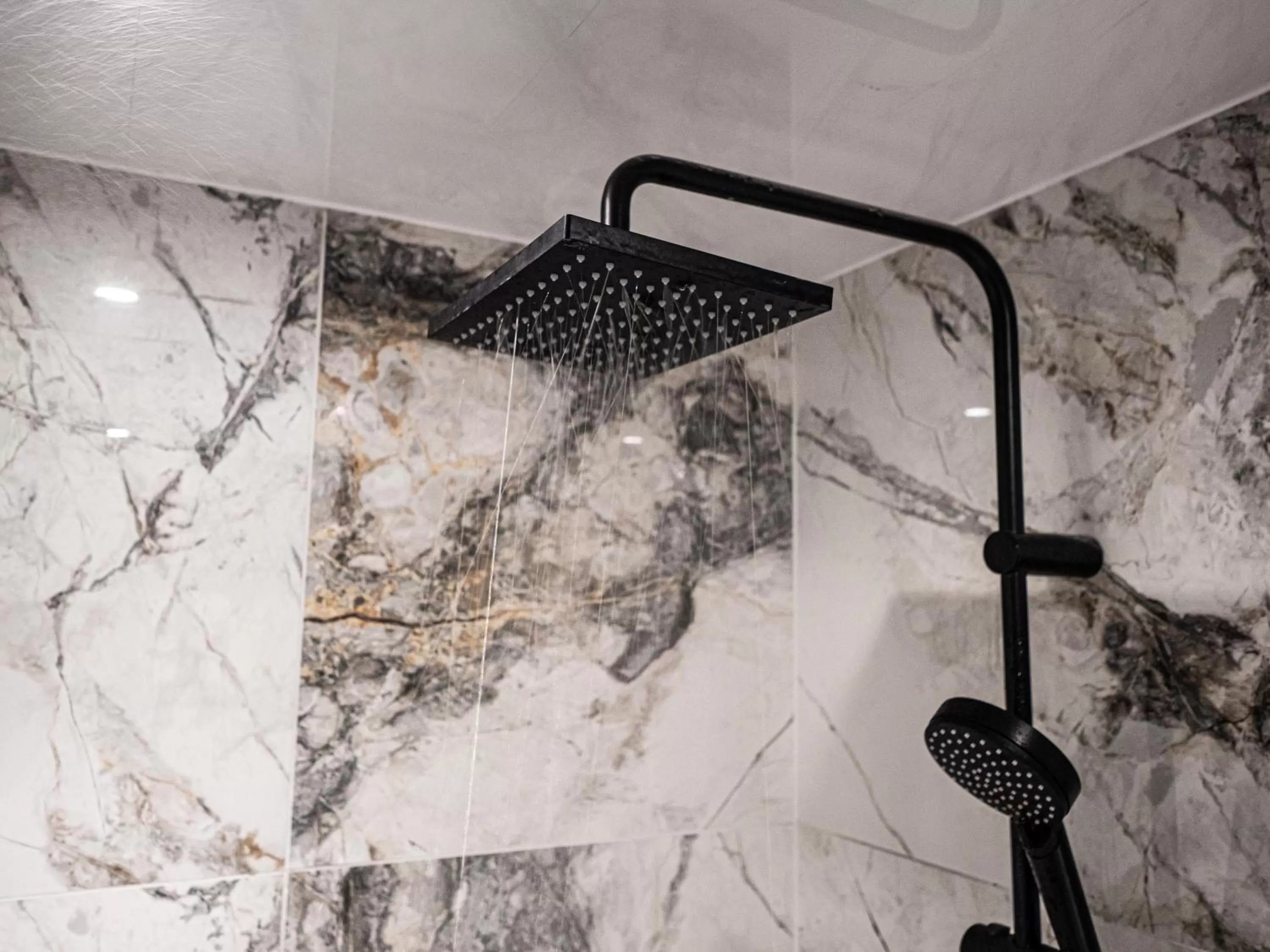 Shower in Hyde Park Green