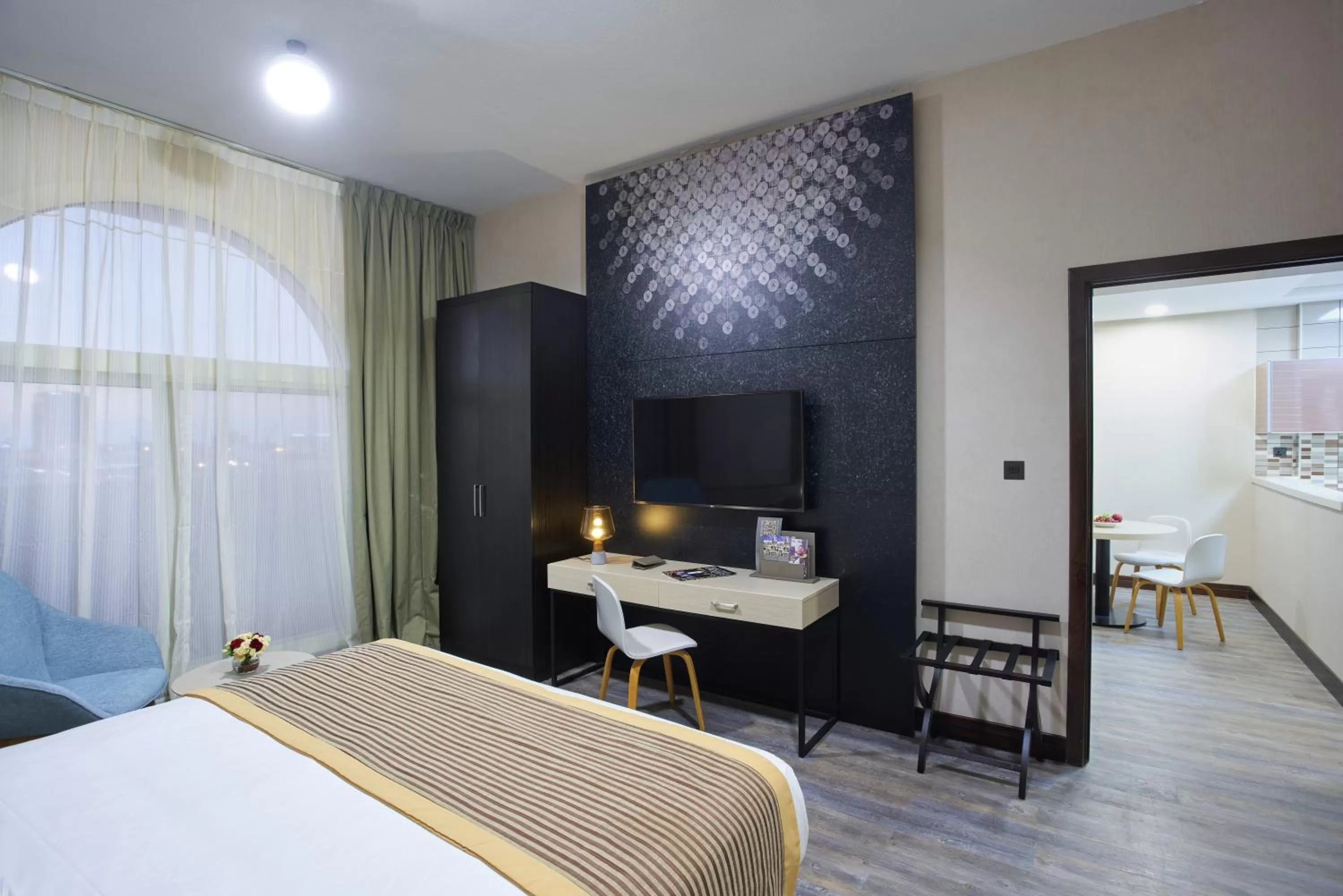 Communal lounge/ TV room, Bed in TIME Express Hotel Al Khan