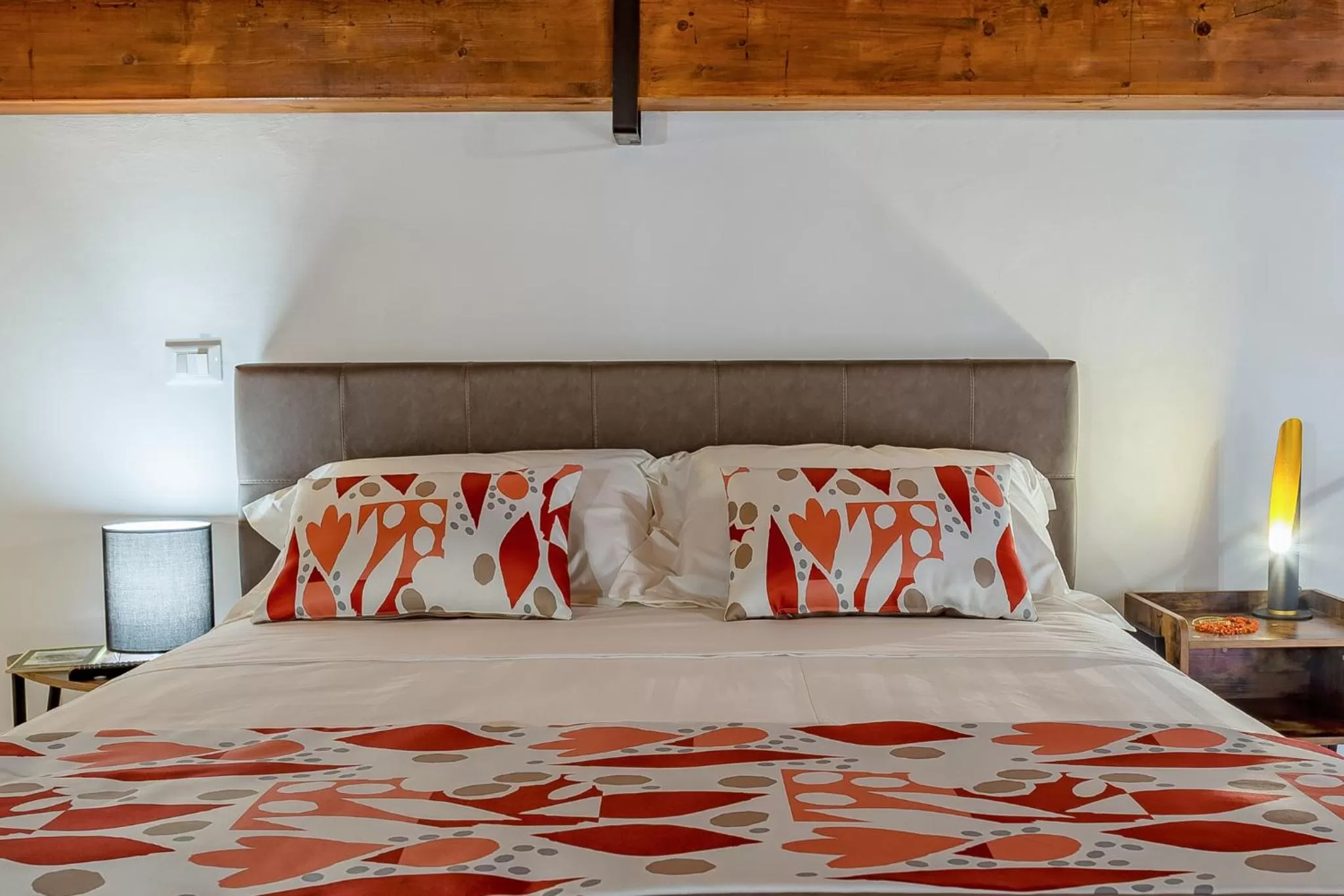 Bed in Le Maestranze Deluxe Rooms