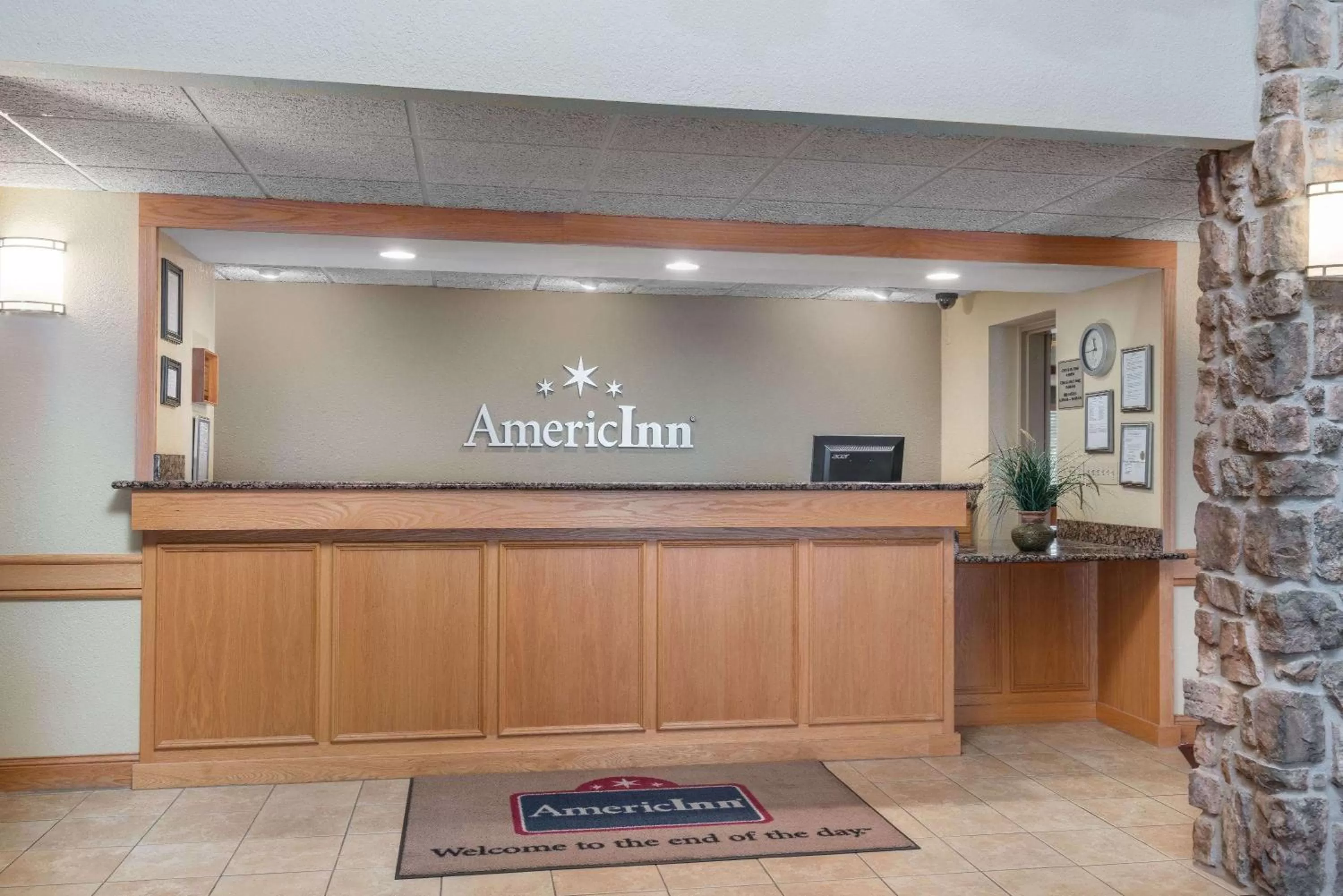 Lobby or reception in AmericInn by Wyndham Newton