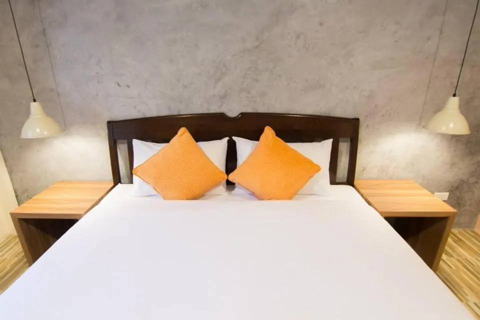 Bed in K.L. Boutique Hotel