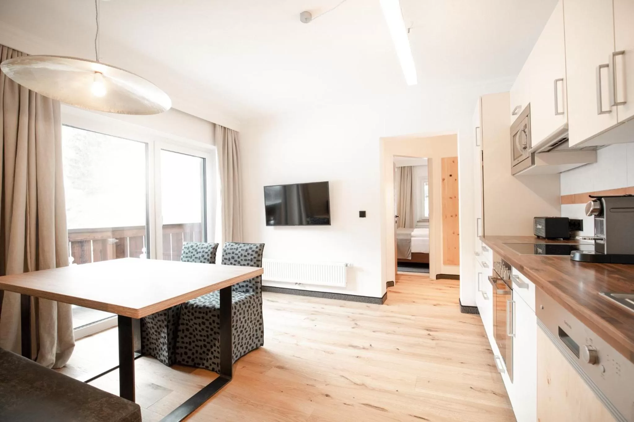 kitchen, Dining Area in Hotel & Appartements Tiroler Buam